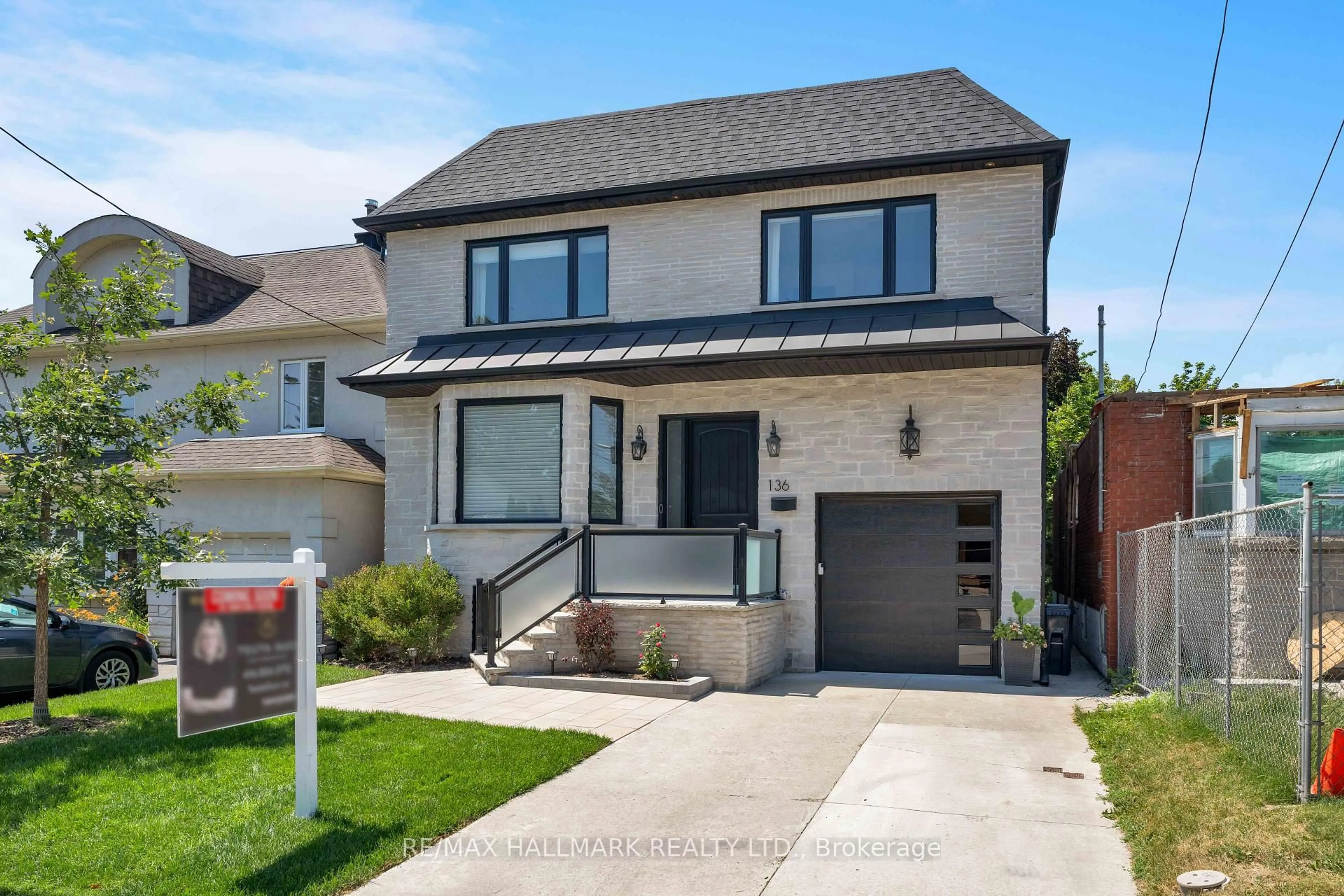 Home with brick exterior material, street for 136 Glenwood Cres, Toronto Ontario M4B 1K2