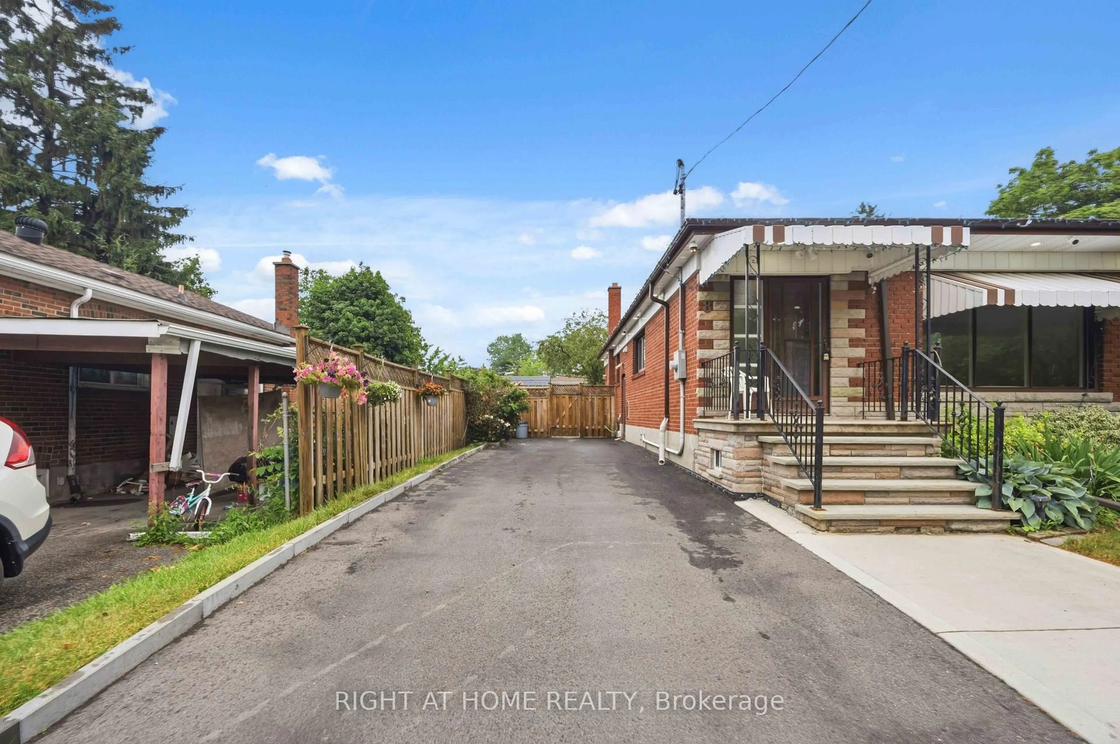 A pic from outside/outdoor area/front of a property/back of a property/a pic from drone, street for 8 Grassington Cres, Toronto Ontario M1G 1X5