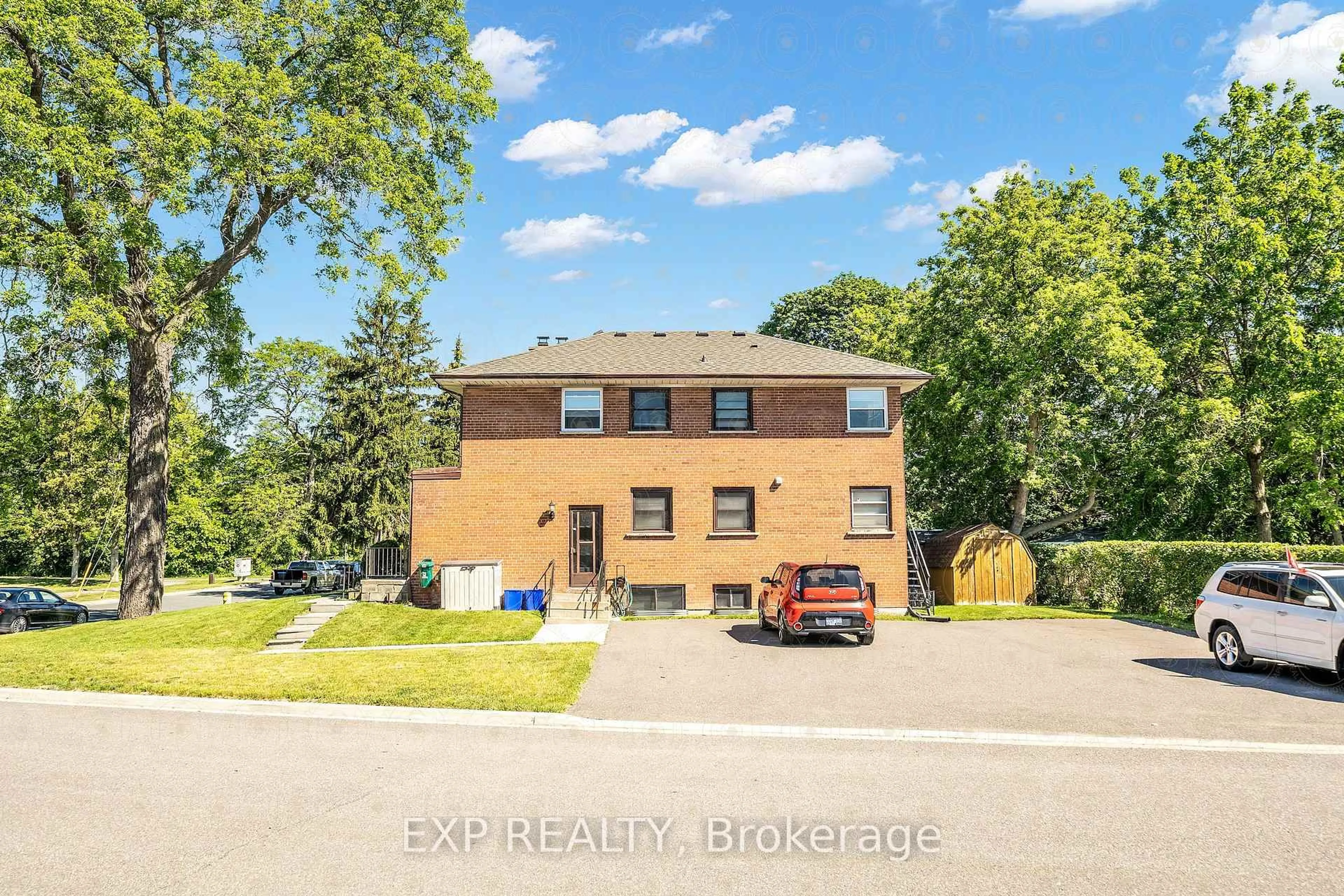 Home with brick exterior material, building for 1121 Centre St, Whitby Ontario L1N 4X7