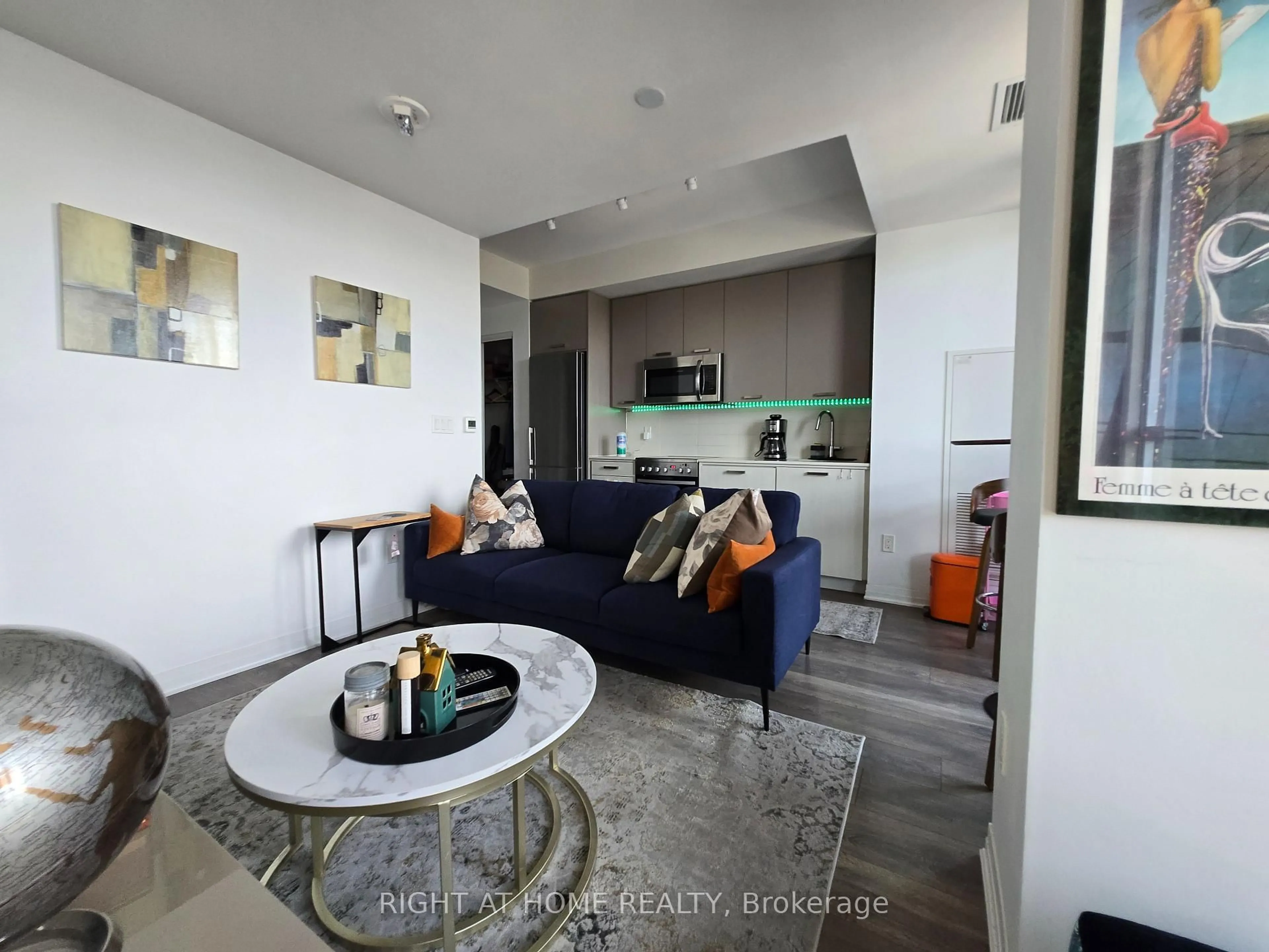 Living room with furniture, unknown for 2301 Danforth Ave #715, Toronto Ontario M4C 0A7