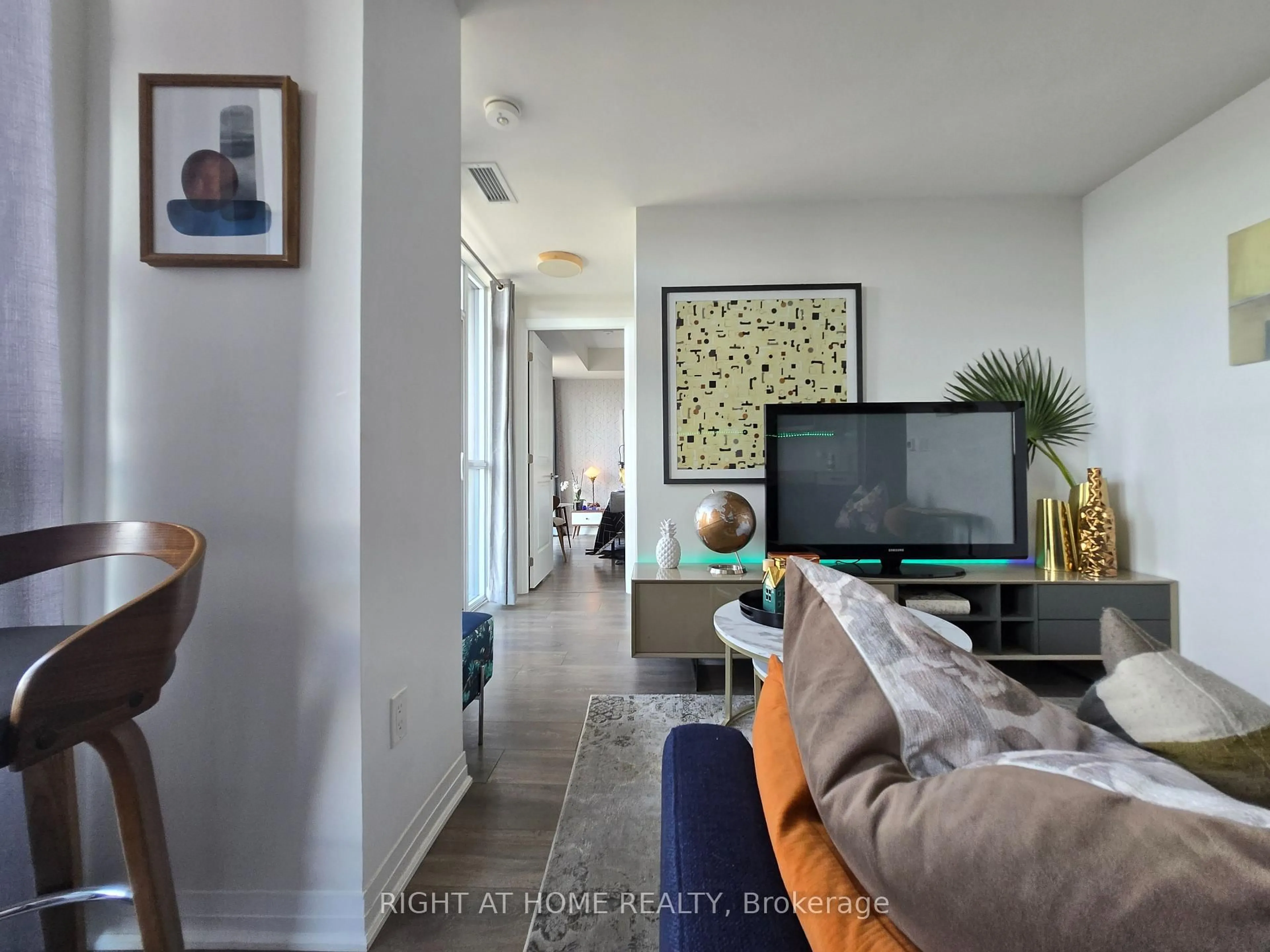 Living room with furniture, unknown for 2301 Danforth Ave #715, Toronto Ontario M4C 0A7