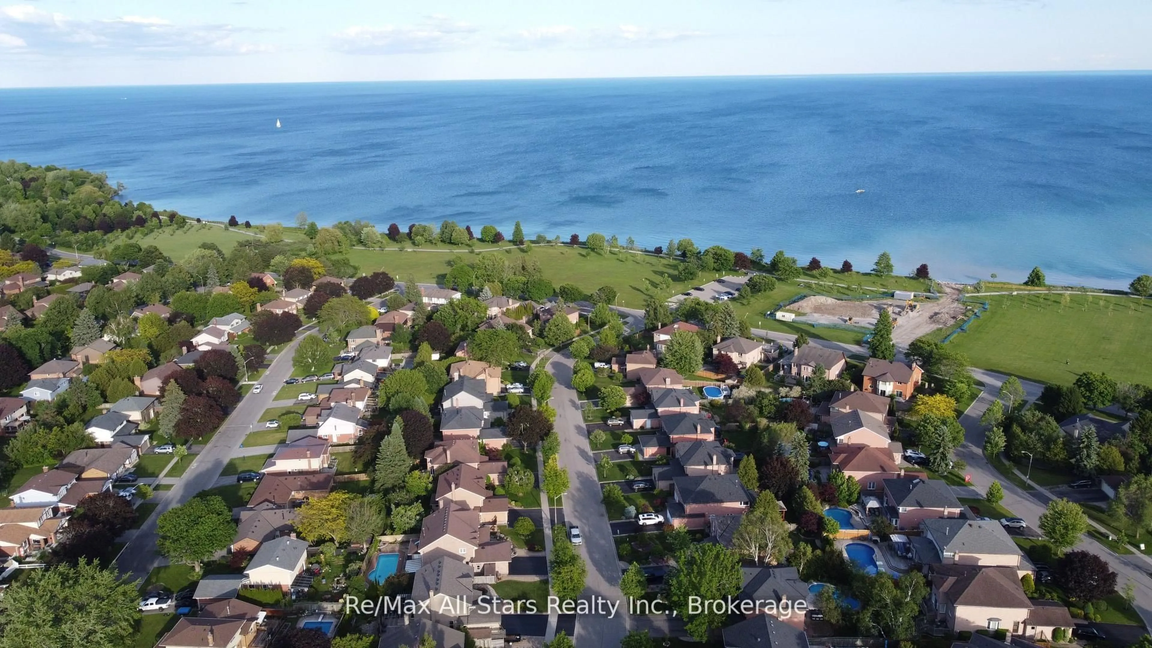 A pic from outside/outdoor area/front of a property/back of a property/a pic from drone, water/lake/river/ocean view for 20 Love Cres, Ajax Ontario L1S 4T1