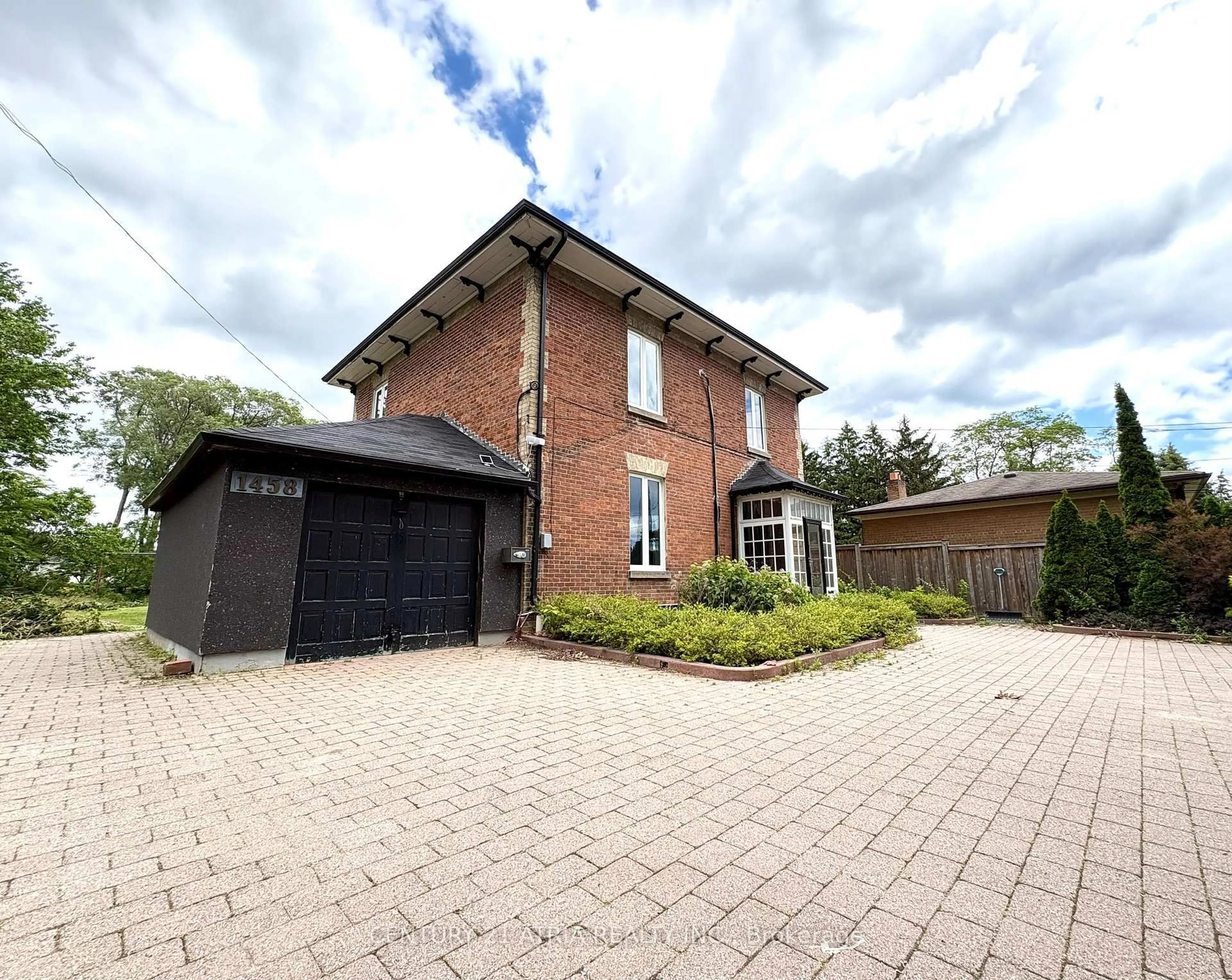 Home with brick exterior material, street for 1458 Military Tr, Toronto Ontario M1C 1A9