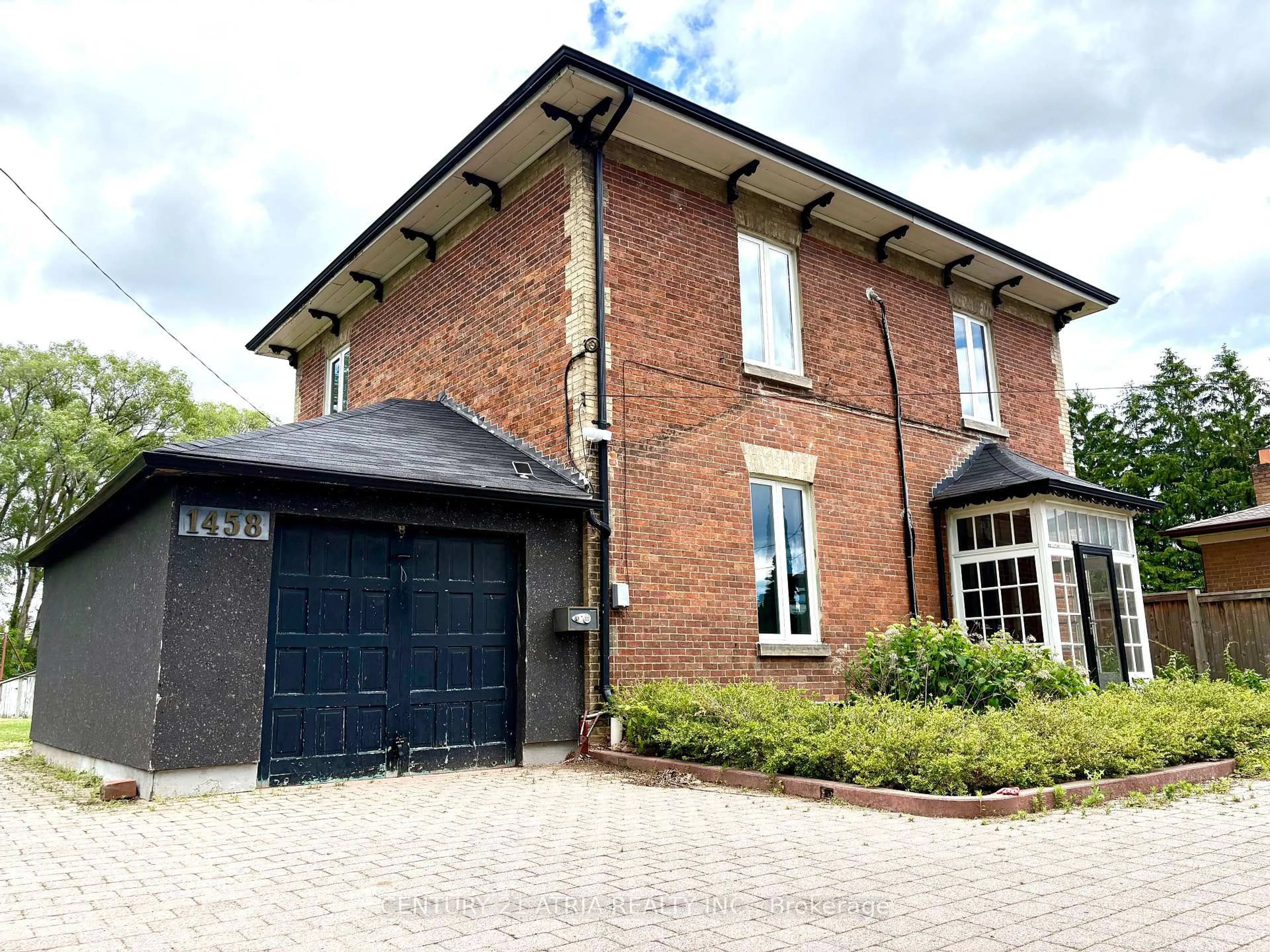 Home with brick exterior material, street for 1458 Military Tr, Toronto Ontario M1C 1A9
