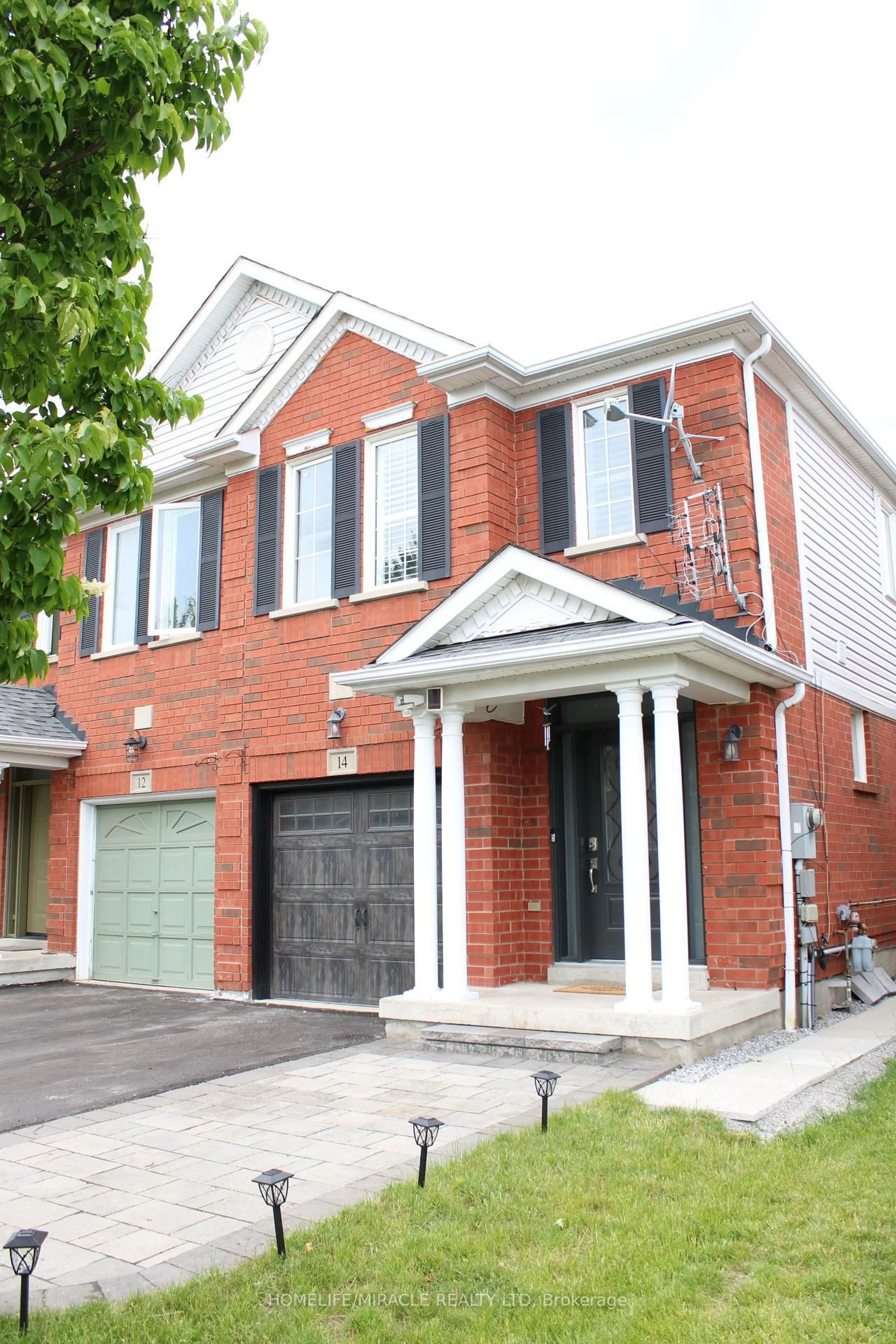 Home with brick exterior material, street for 14 Unsworth Cres, Ajax Ontario L1T 4Y2