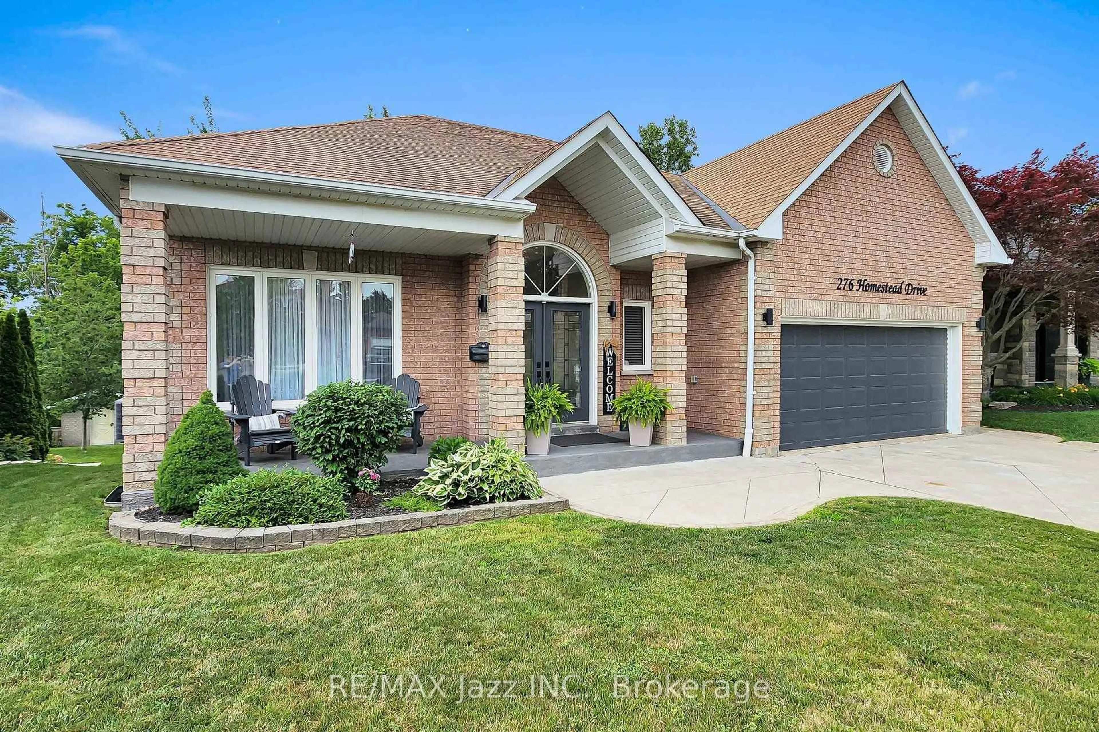 Home with brick exterior material, street for 276 Homestead Dr, Oshawa Ontario L1J 6V1