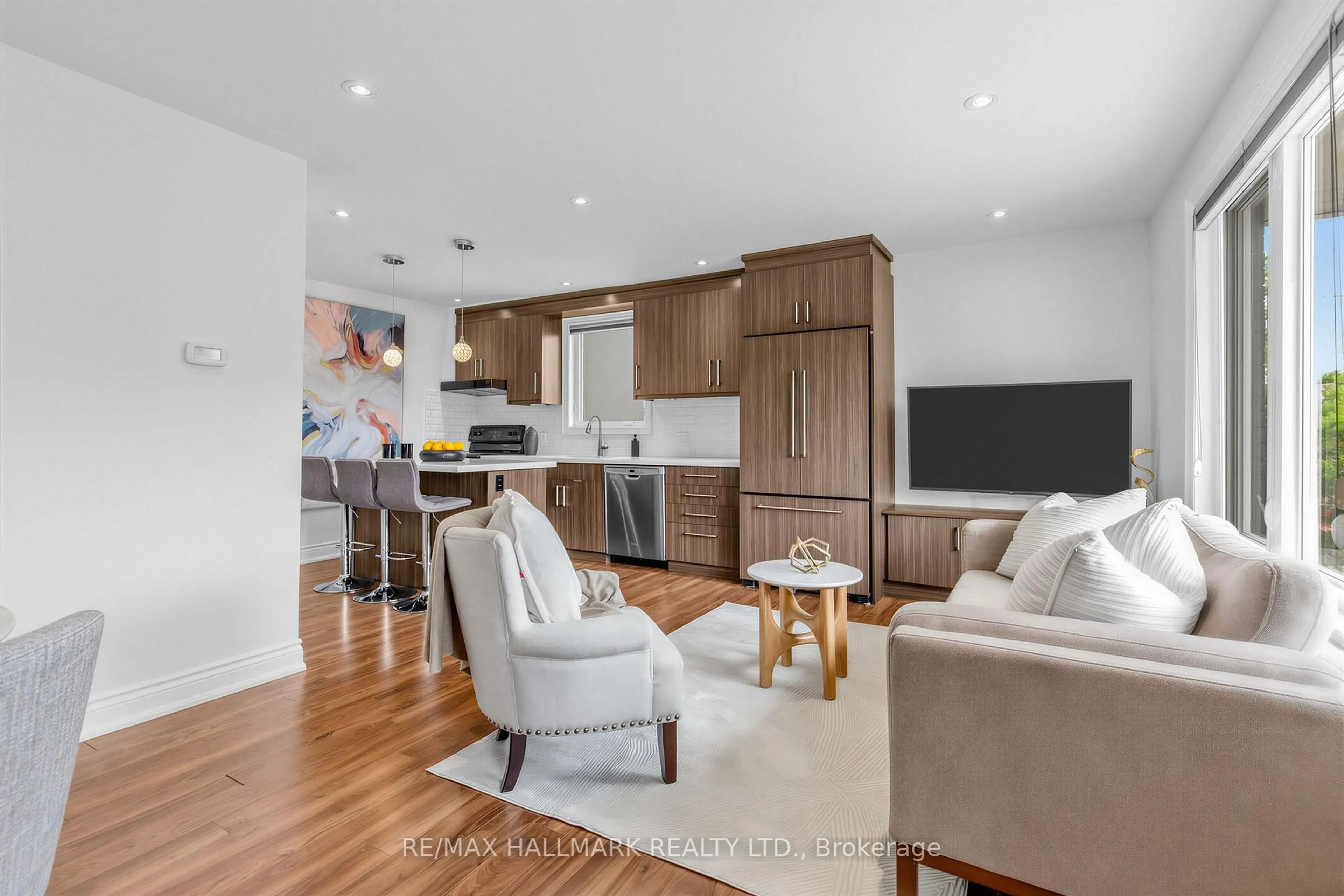 Open concept kitchen, wood/laminate floor for 66 Holmstead Ave, Toronto Ontario M4B 1T2