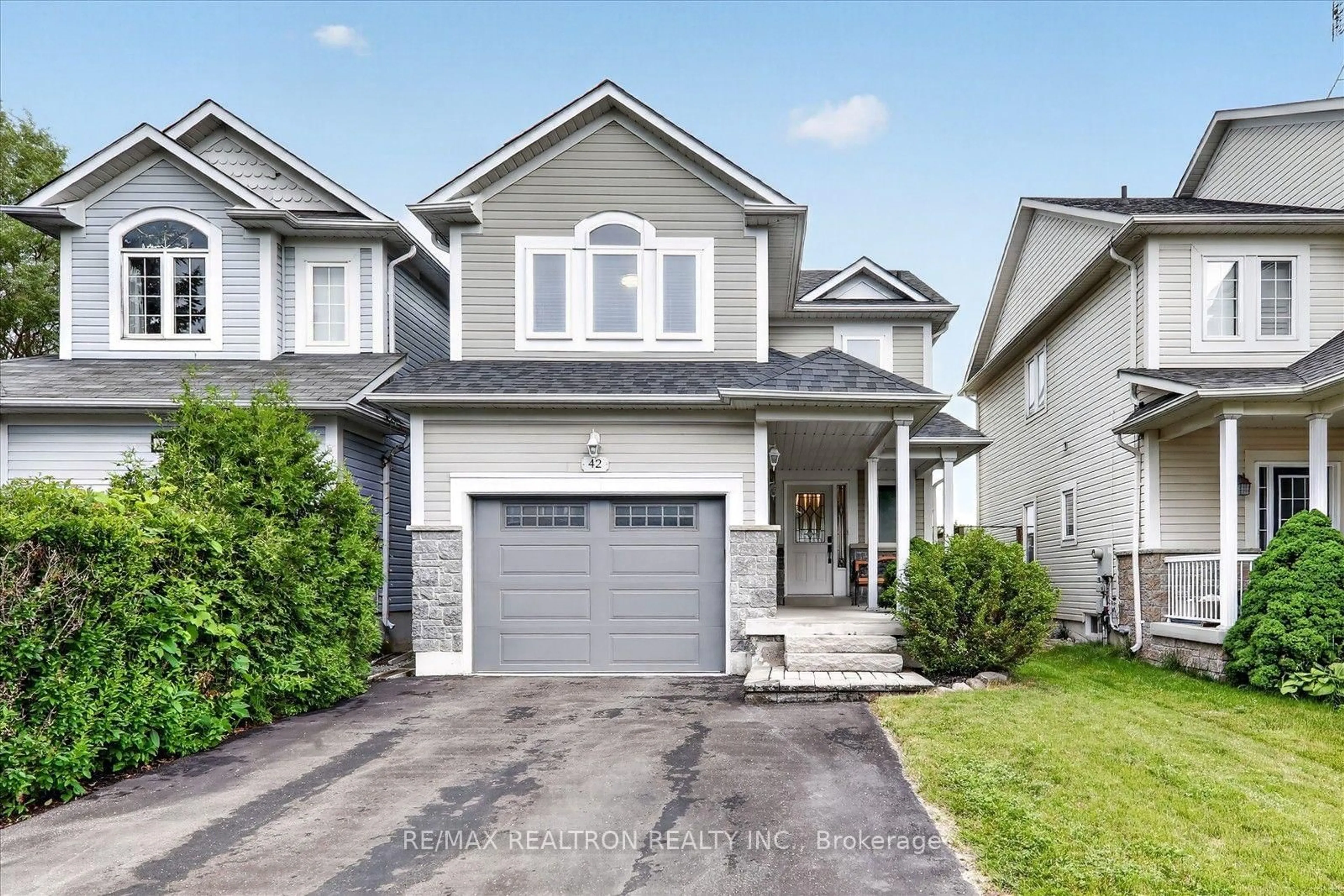 Home with vinyl exterior material, street for 42 Hanna Dr, Clarington Ontario L1C 5M4