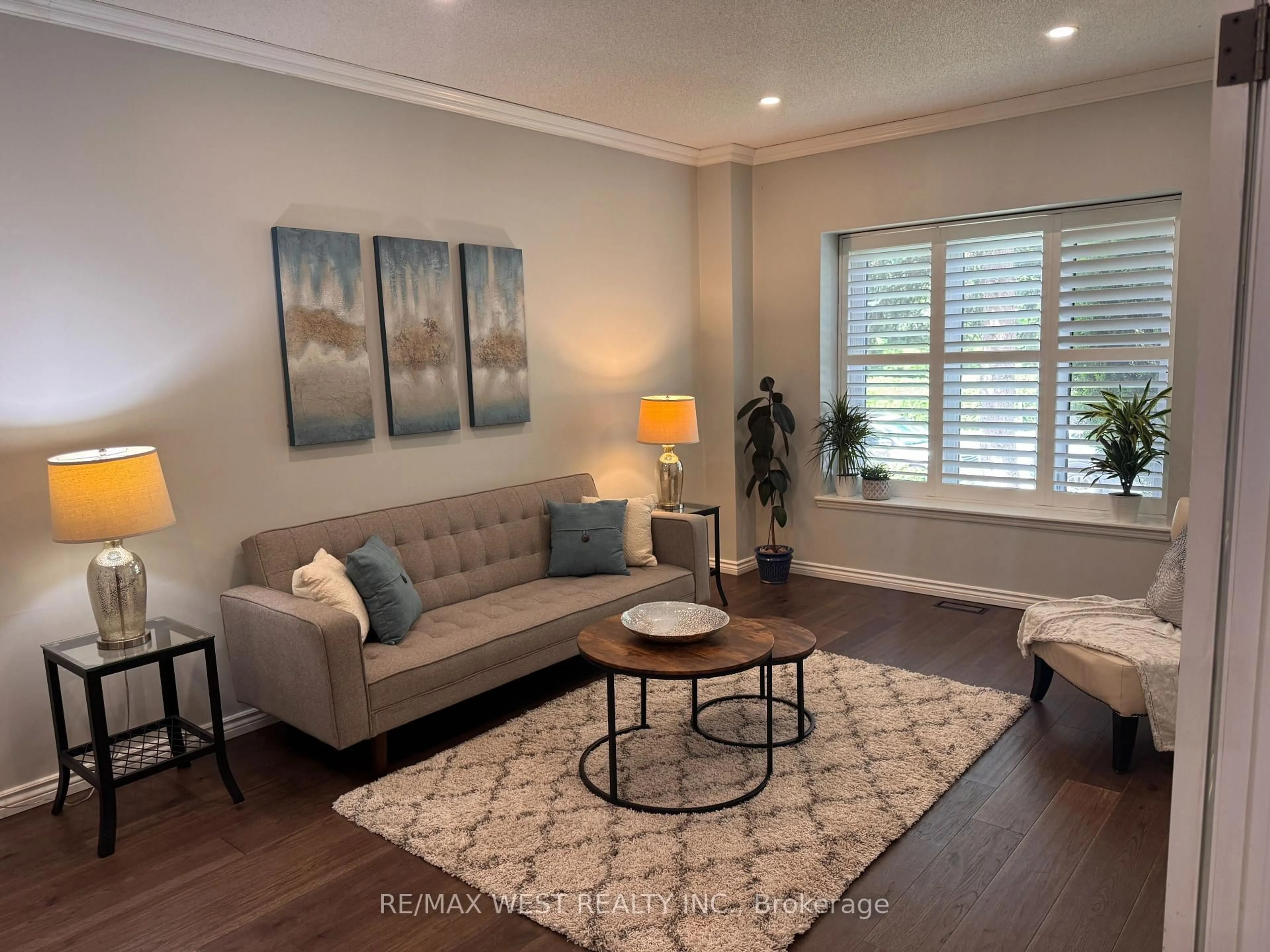Living room with furniture, wood/laminate floor for 1931 Fairport Rd, Pickering Ontario L1V 1T5