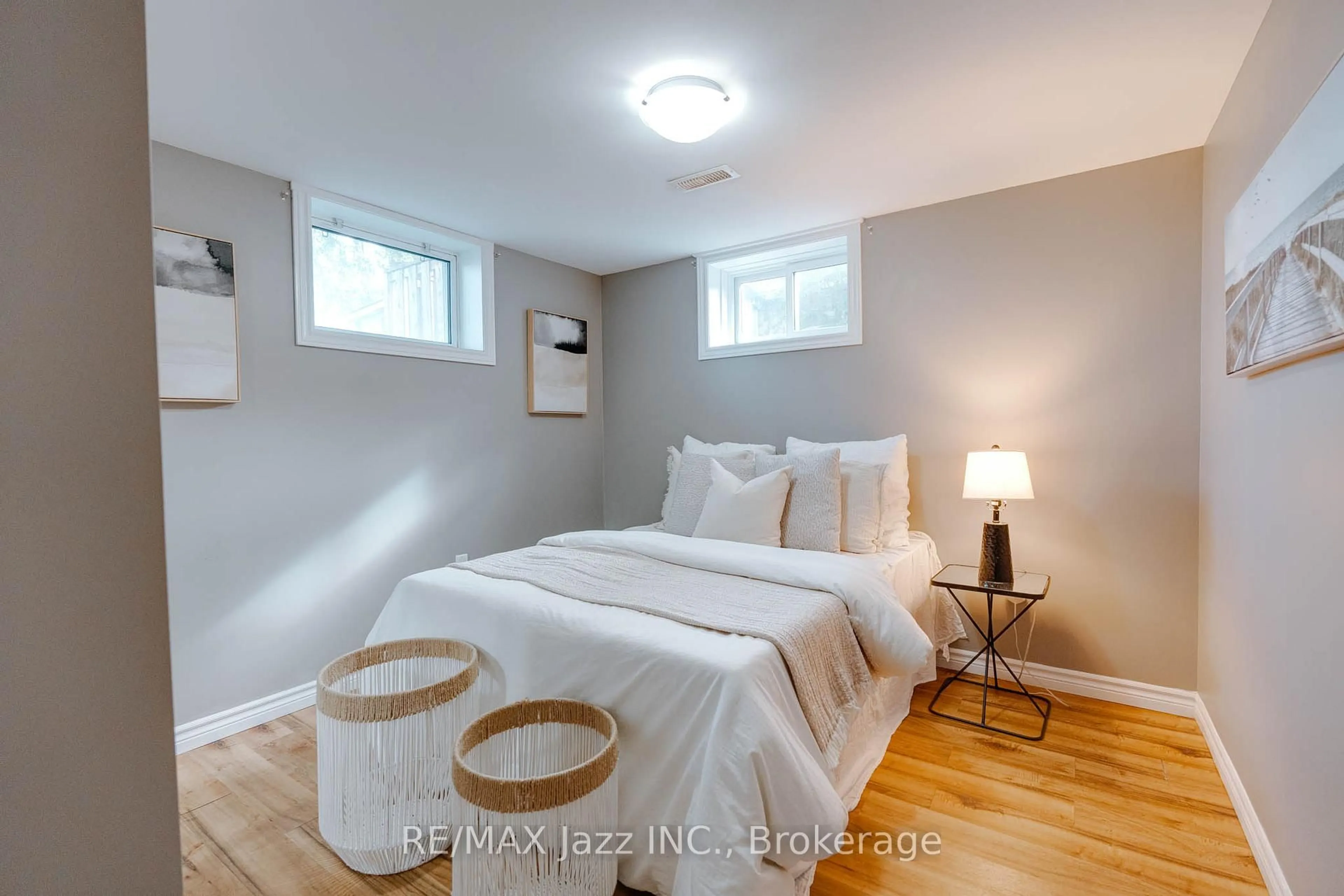 Bedroom with bed, wood/laminate floor for 81 Wellington Ave, Oshawa Ontario L1H 3X8
