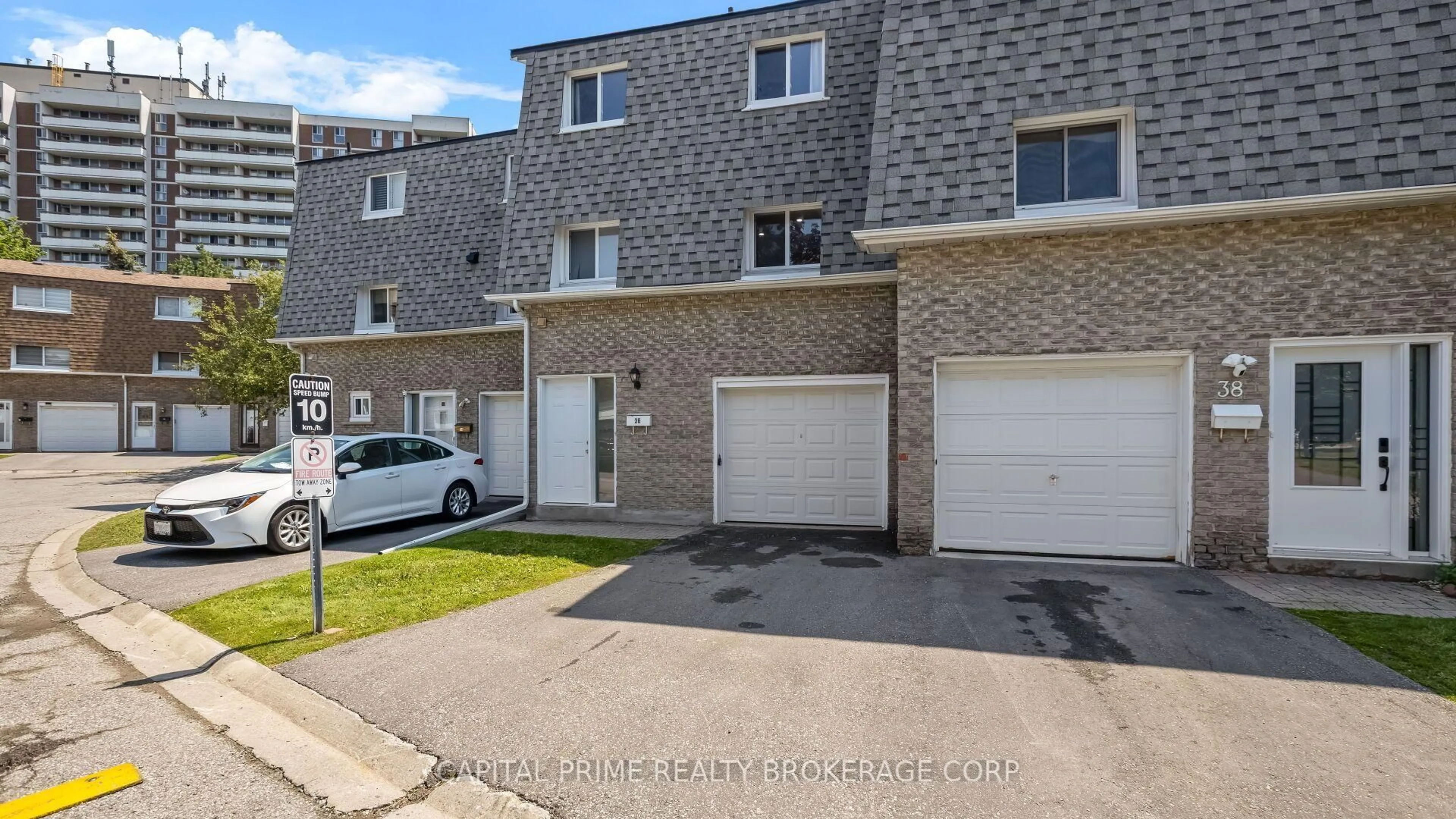 A pic from outside/outdoor area/front of a property/back of a property/a pic from drone, street for 250 Bridletowne Circ #36, Toronto Ontario M1W 2G8
