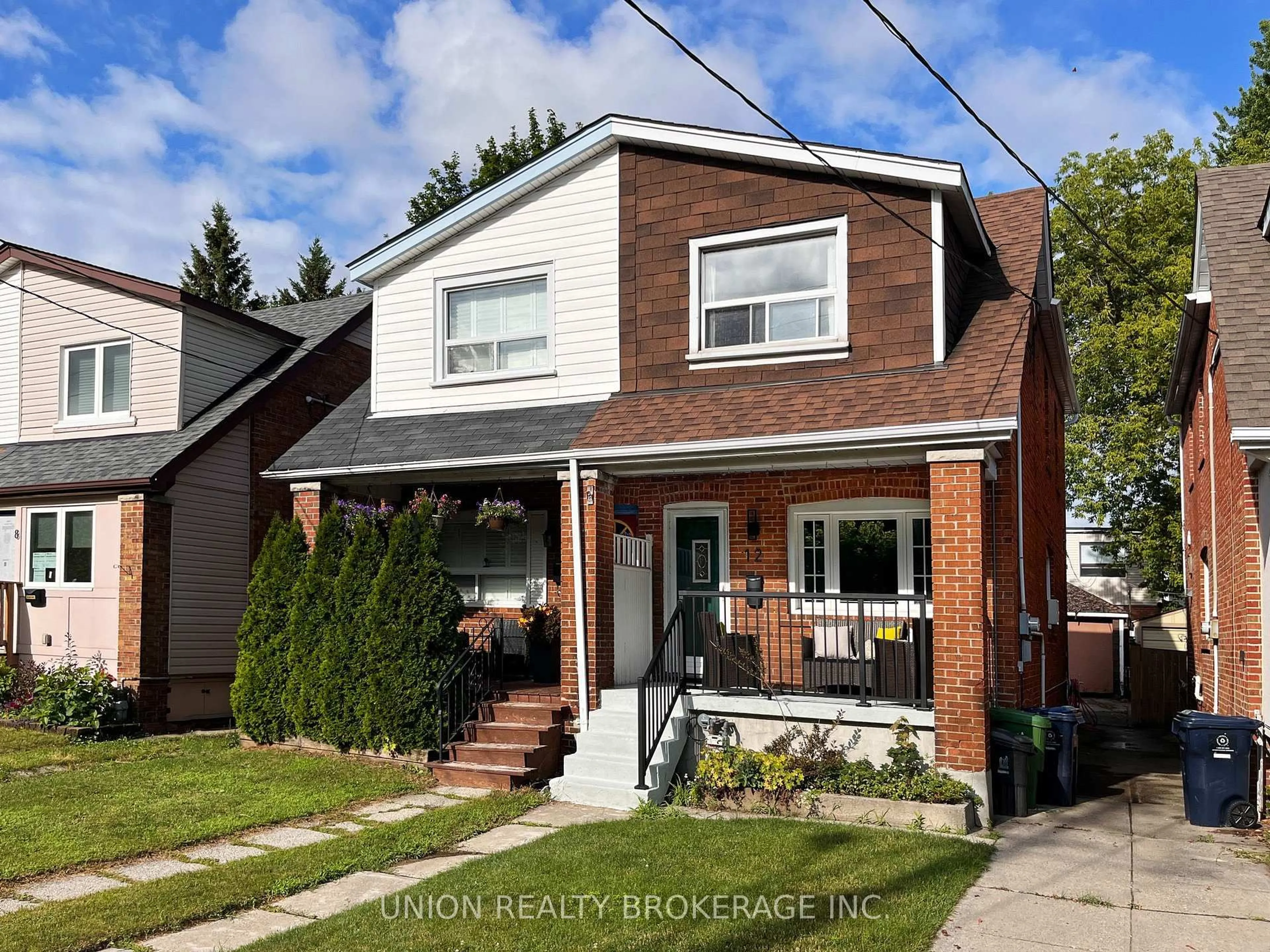 Home with brick exterior material, street for 12 Durant Ave, Toronto Ontario M4J 4V9