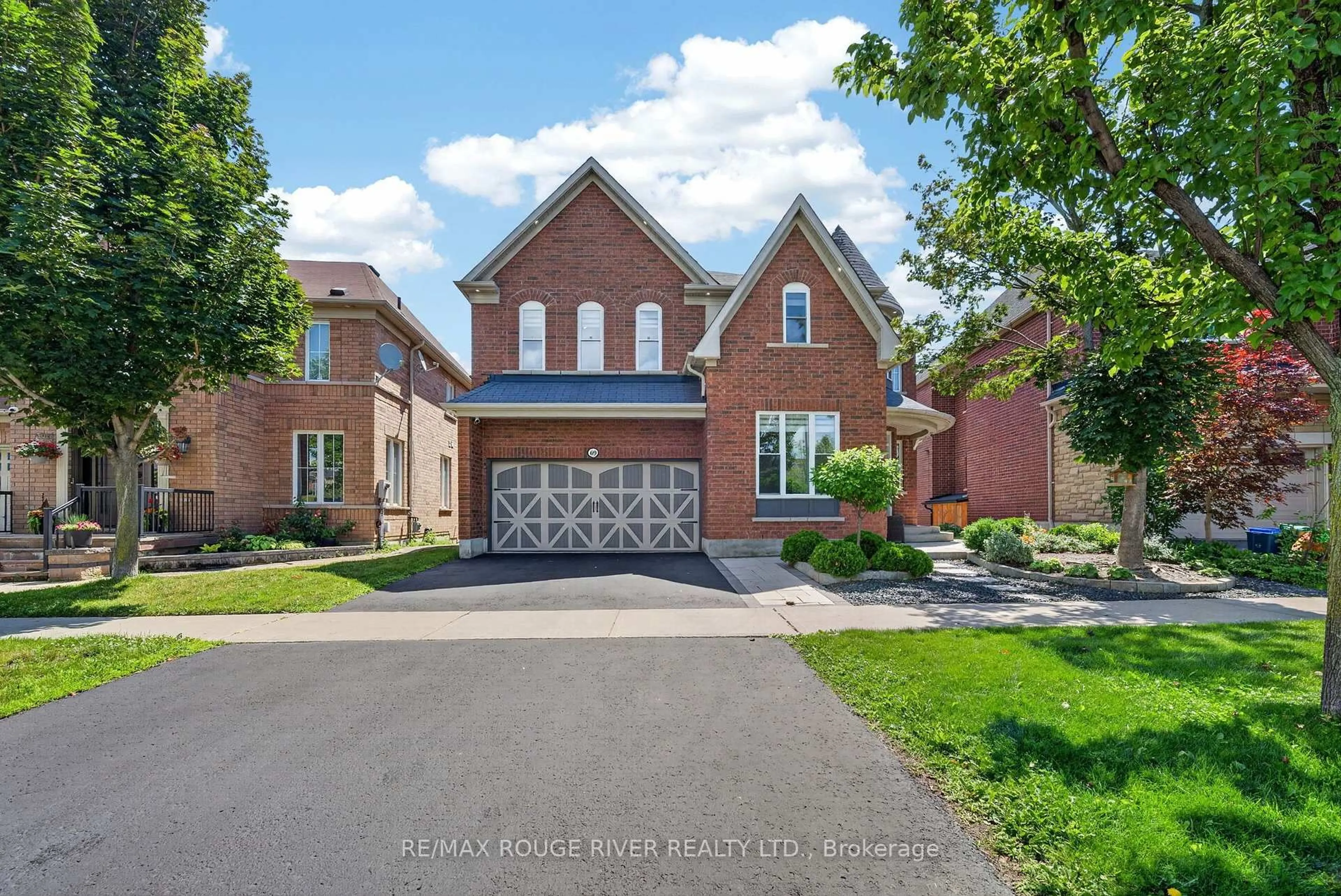 Home with brick exterior material, street for 69 Gillett Dr, Ajax Ontario L1Z 0E2