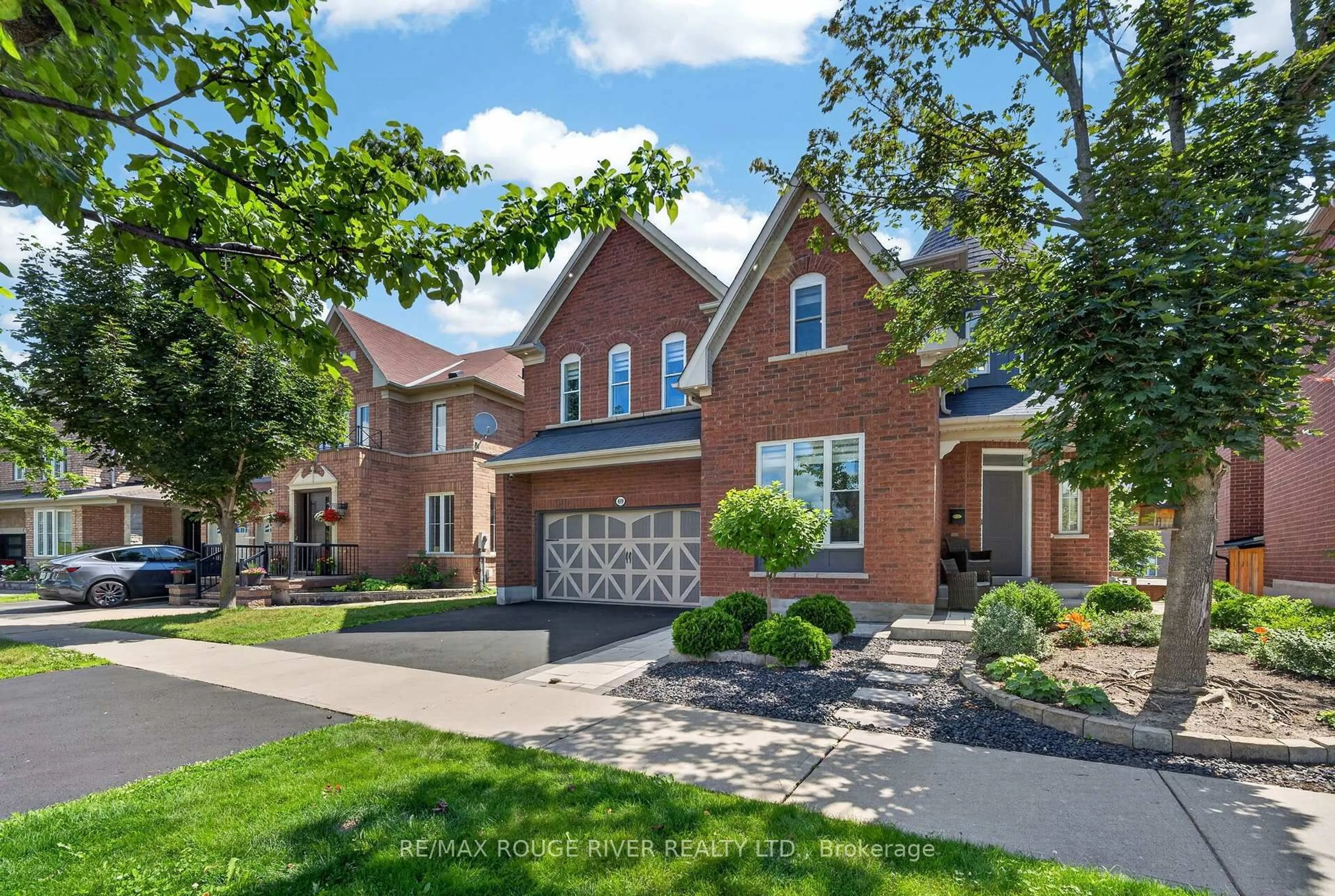 Home with brick exterior material, street for 69 Gillett Dr, Ajax Ontario L1Z 0E2