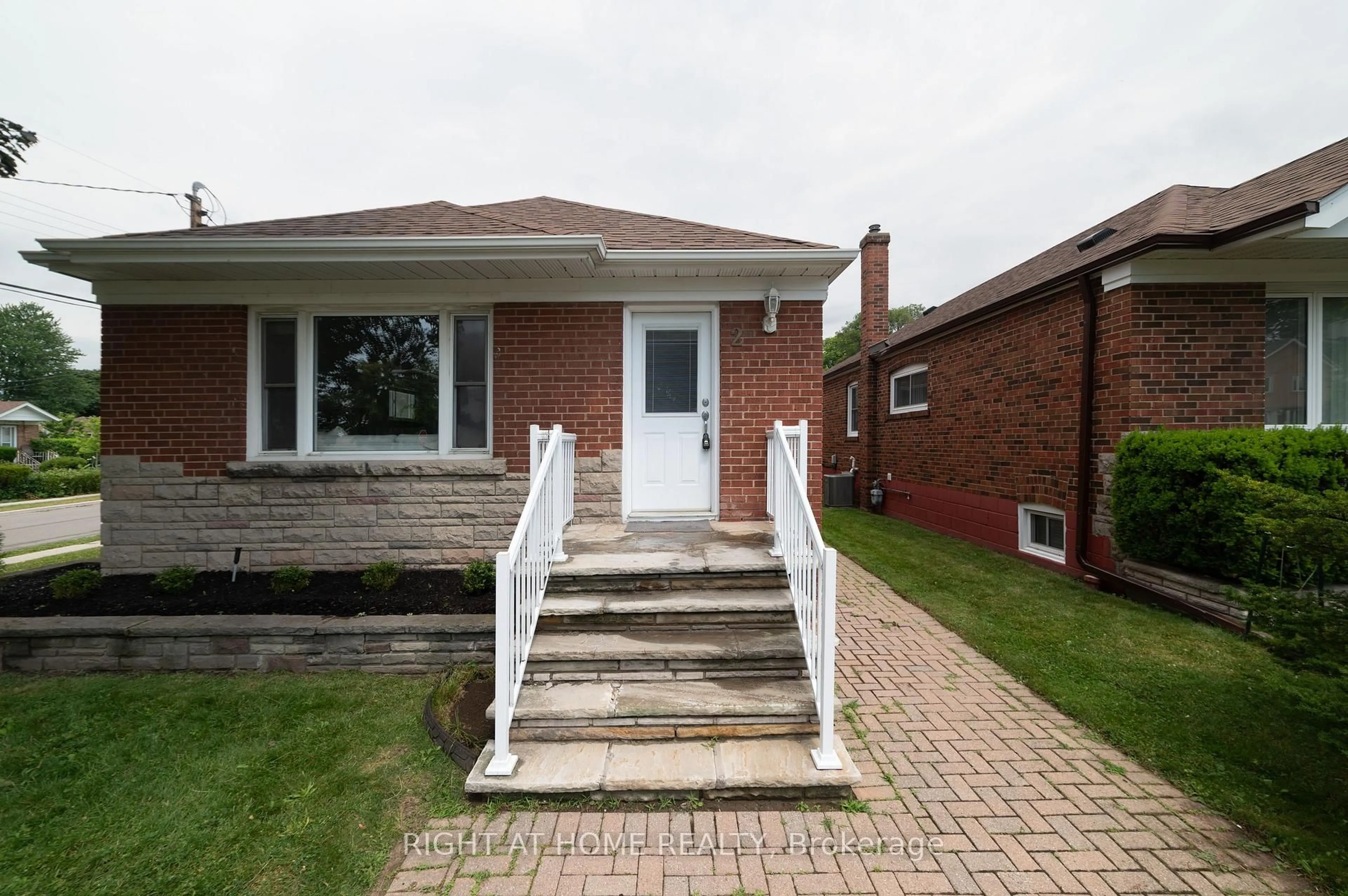 Home with brick exterior material, street for 2 Midholm Dr, Toronto Ontario M1K 3A9