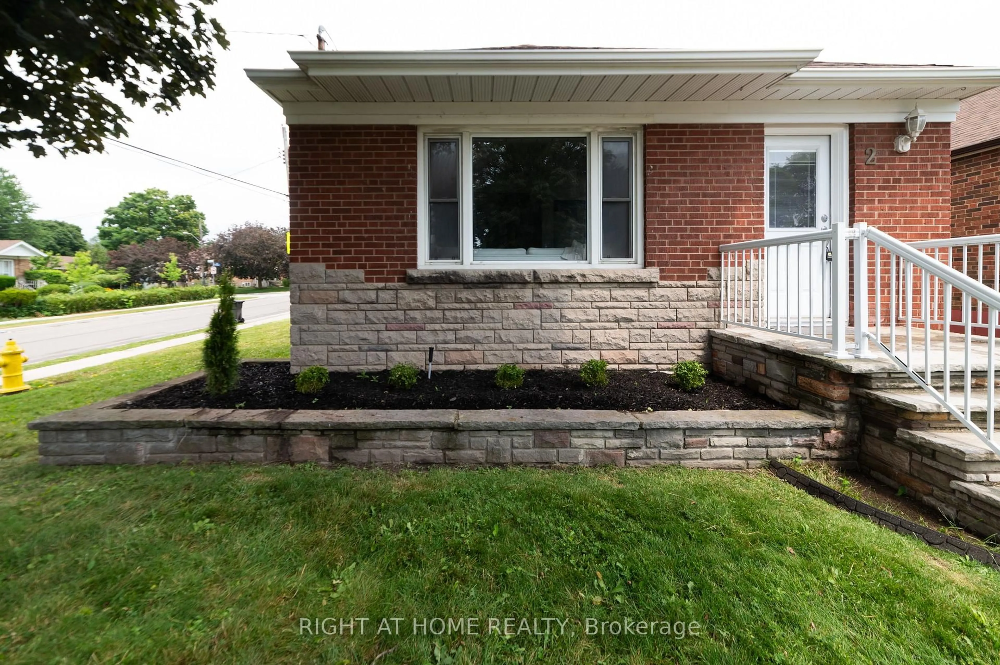 Home with brick exterior material, street for 2 Midholm Dr, Toronto Ontario M1K 3A9