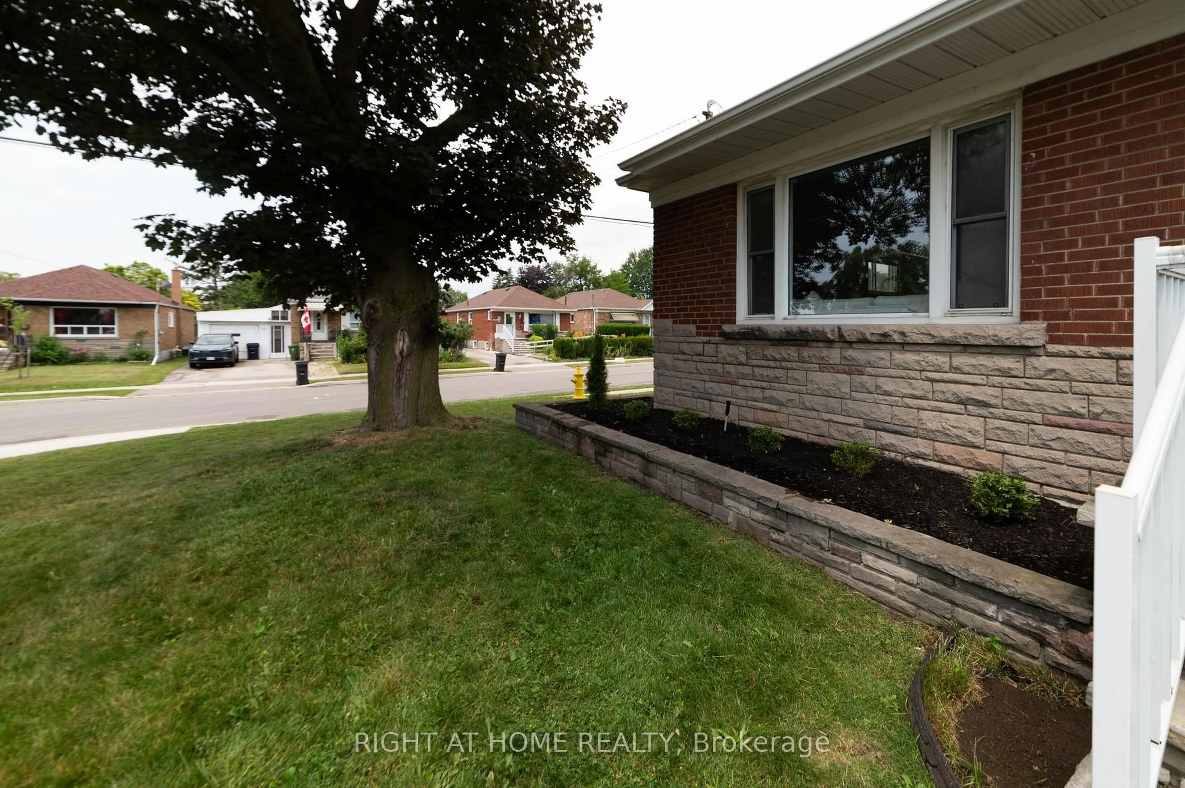 Home with brick exterior material, street for 2 Midholm Dr, Toronto Ontario M1K 3A9