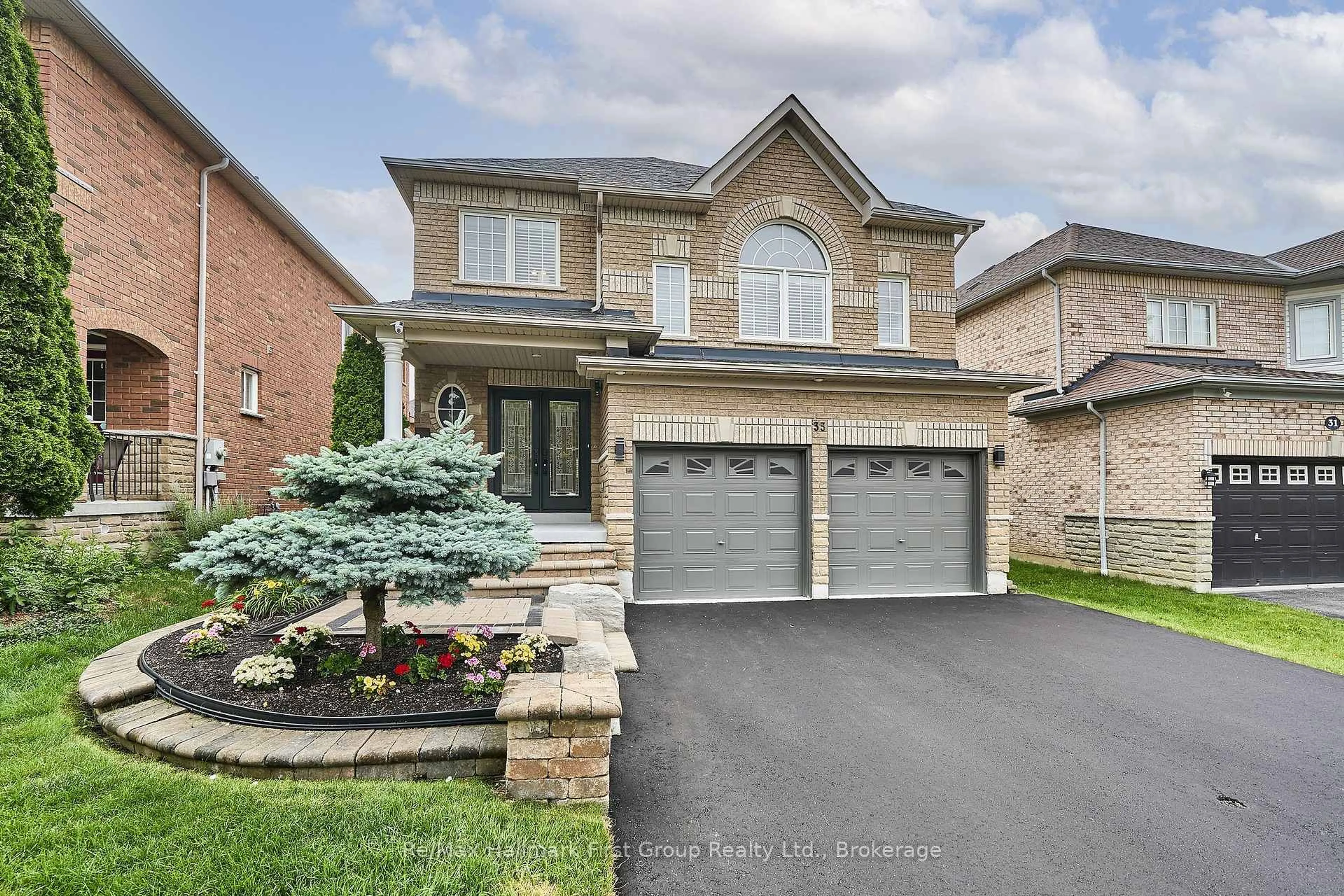 Home with brick exterior material, street for 33 Carlinds Dr, Whitby Ontario L1R 3B9