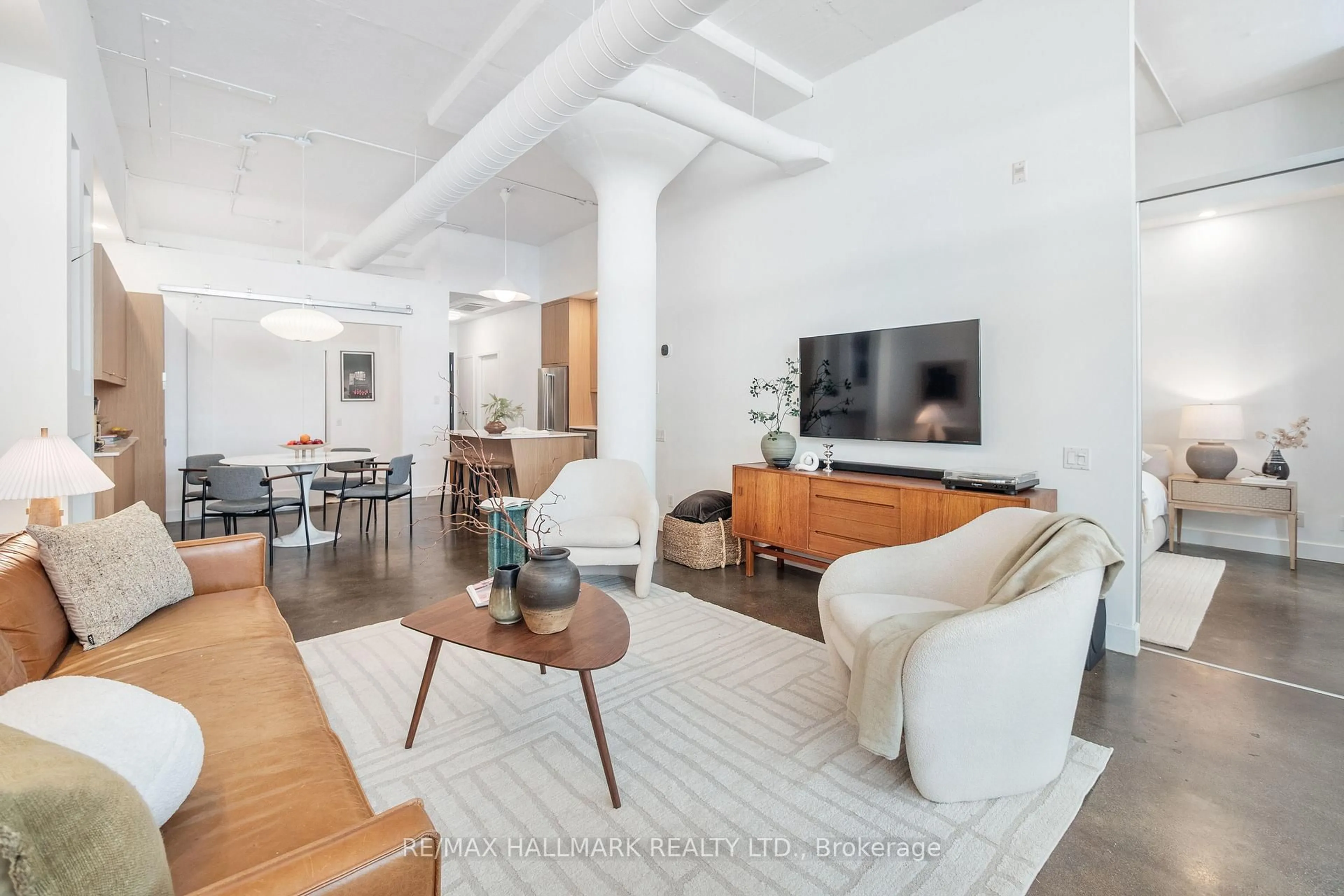Living room with furniture, unknown for 233 Carlaw Ave #406, Toronto Ontario M4M 3N6