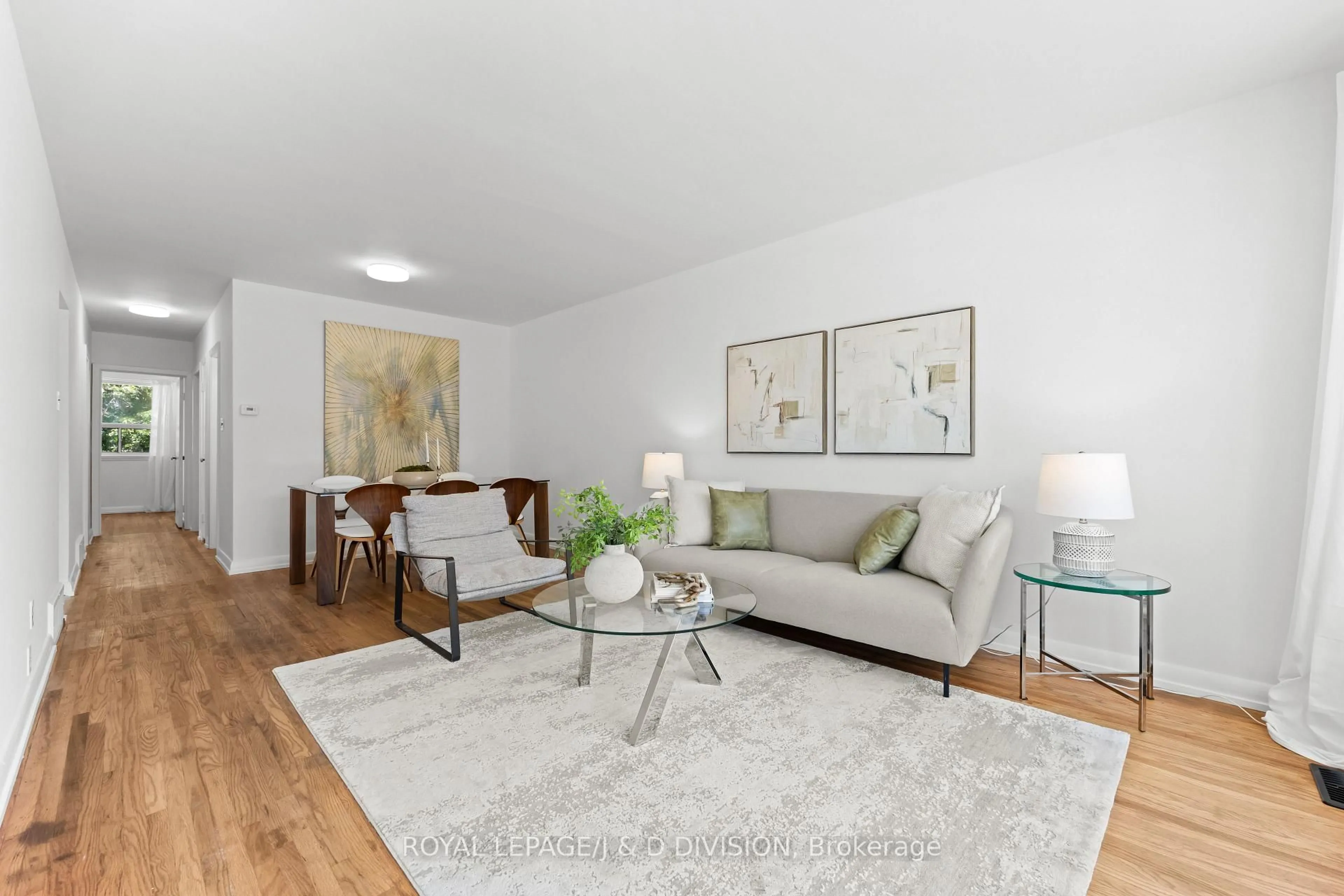 Living room with furniture, wood/laminate floor for 41 Clapperton Ave, Toronto Ontario M1L 4K7