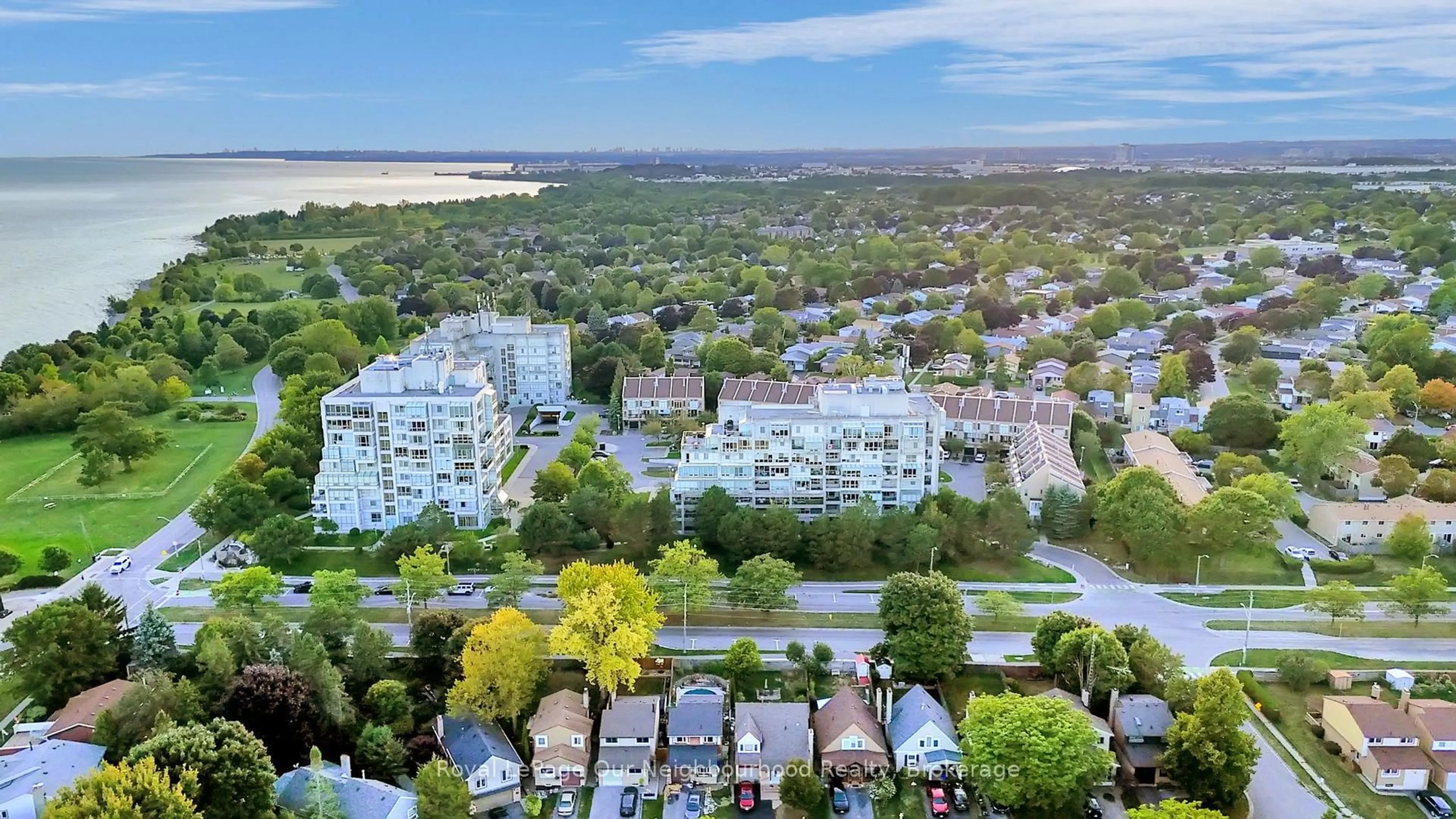 A pic from outside/outdoor area/front of a property/back of a property/a pic from drone, water/lake/river/ocean view for 25 Cumberland Lane #304, Ajax Ontario L1S 7K1