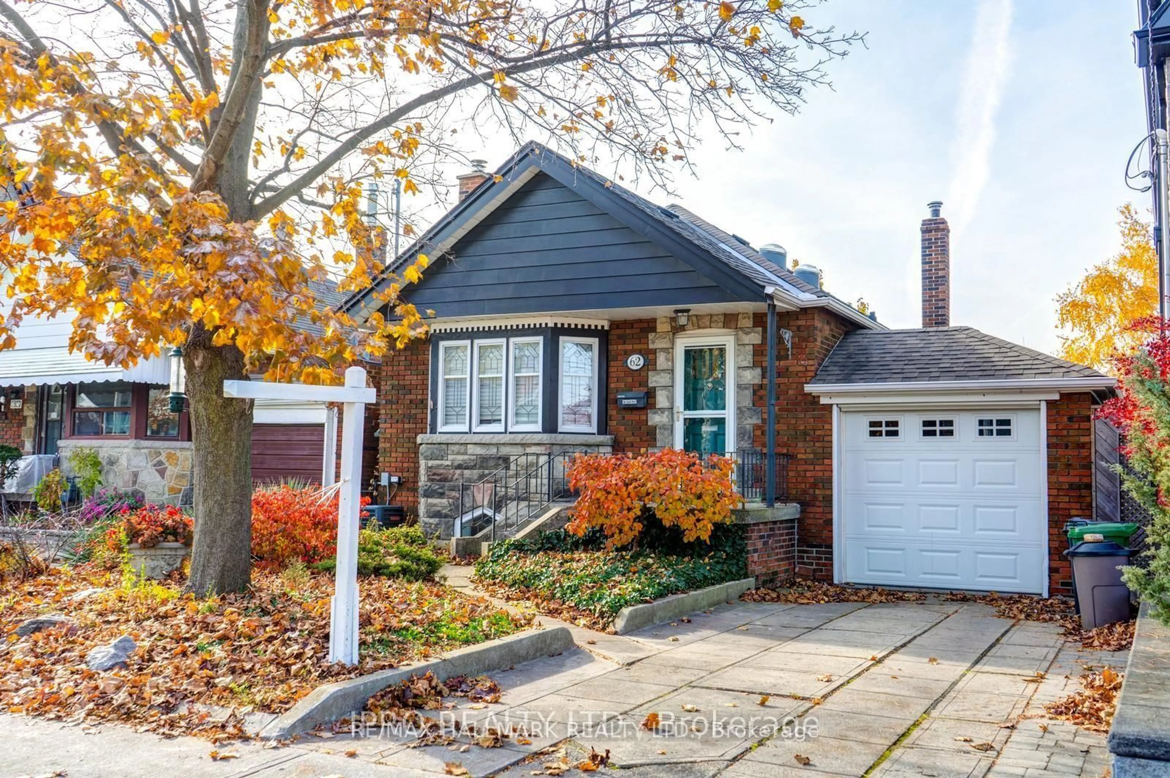 Home with brick exterior material, street for 62 Lankin Blvd, Toronto Ontario M4J 4X1