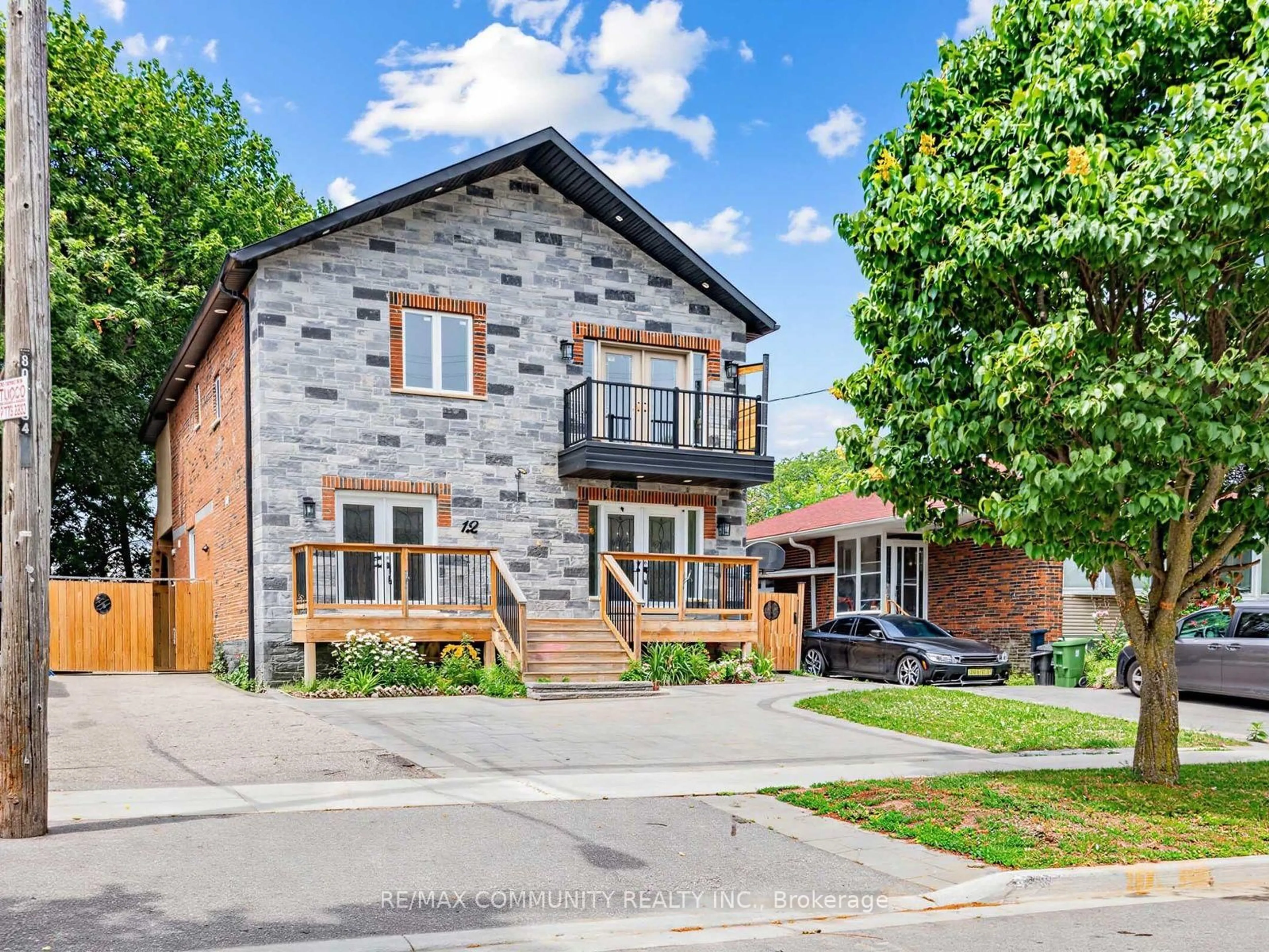 Home with brick exterior material, street for 12 Janray Dr, Toronto Ontario M1G 1Y1