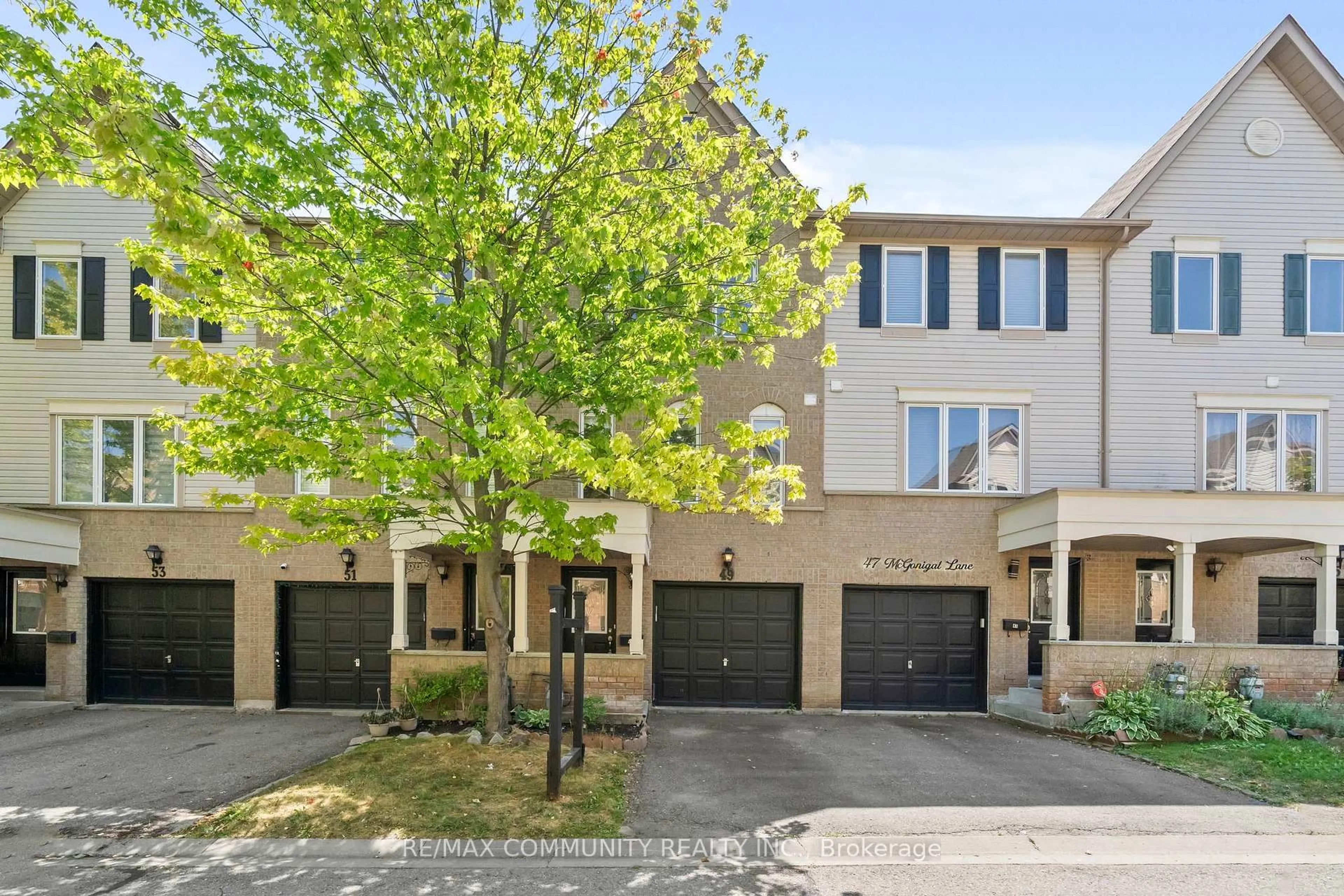 A pic from outside/outdoor area/front of a property/back of a property/a pic from drone, street for 49 Mcgonigal Lane, Ajax Ontario L1T 4H1