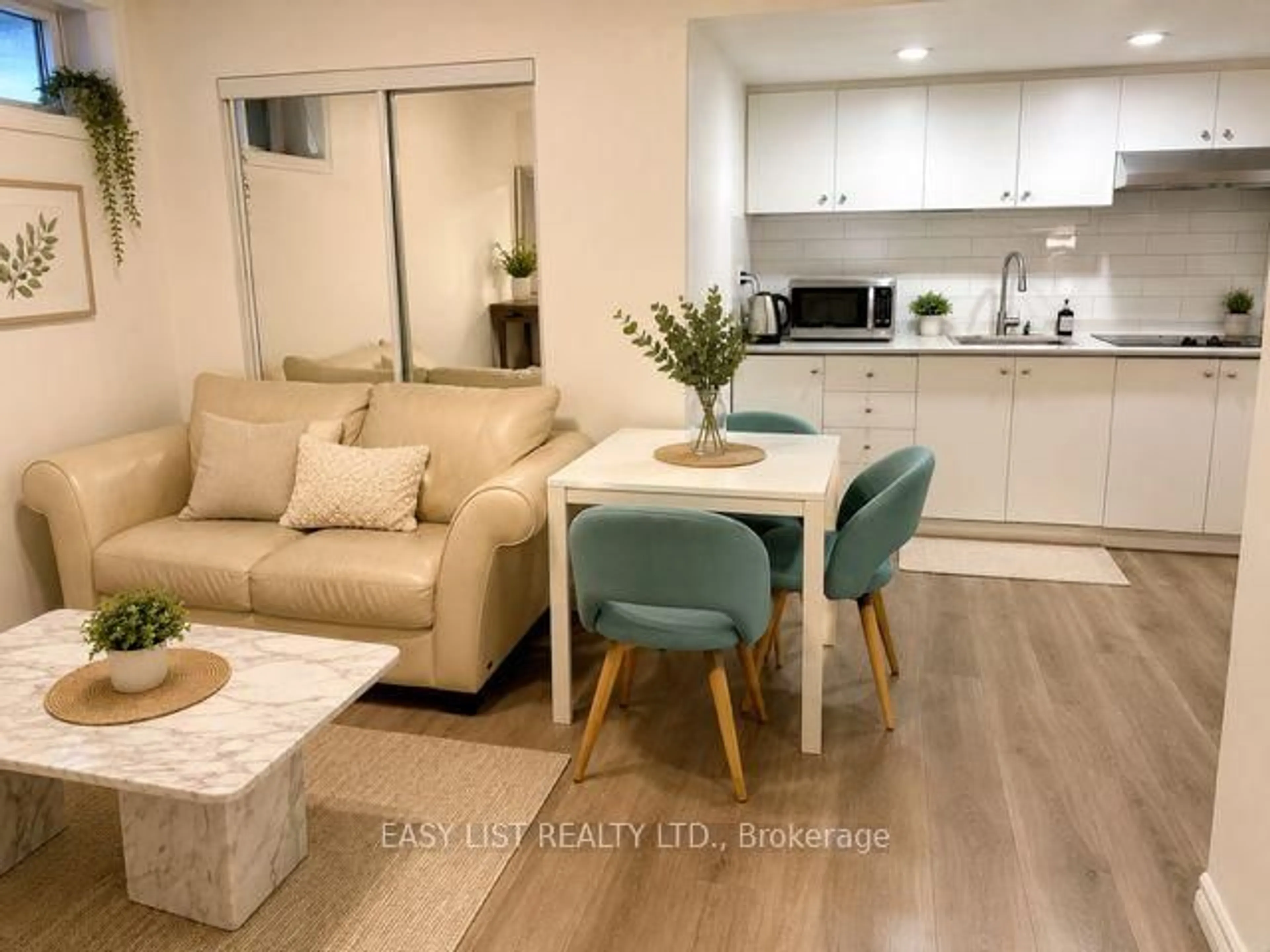 Living room with furniture, wood/laminate floor for 15 Summerglade Dr, Toronto Ontario M1S 1W8