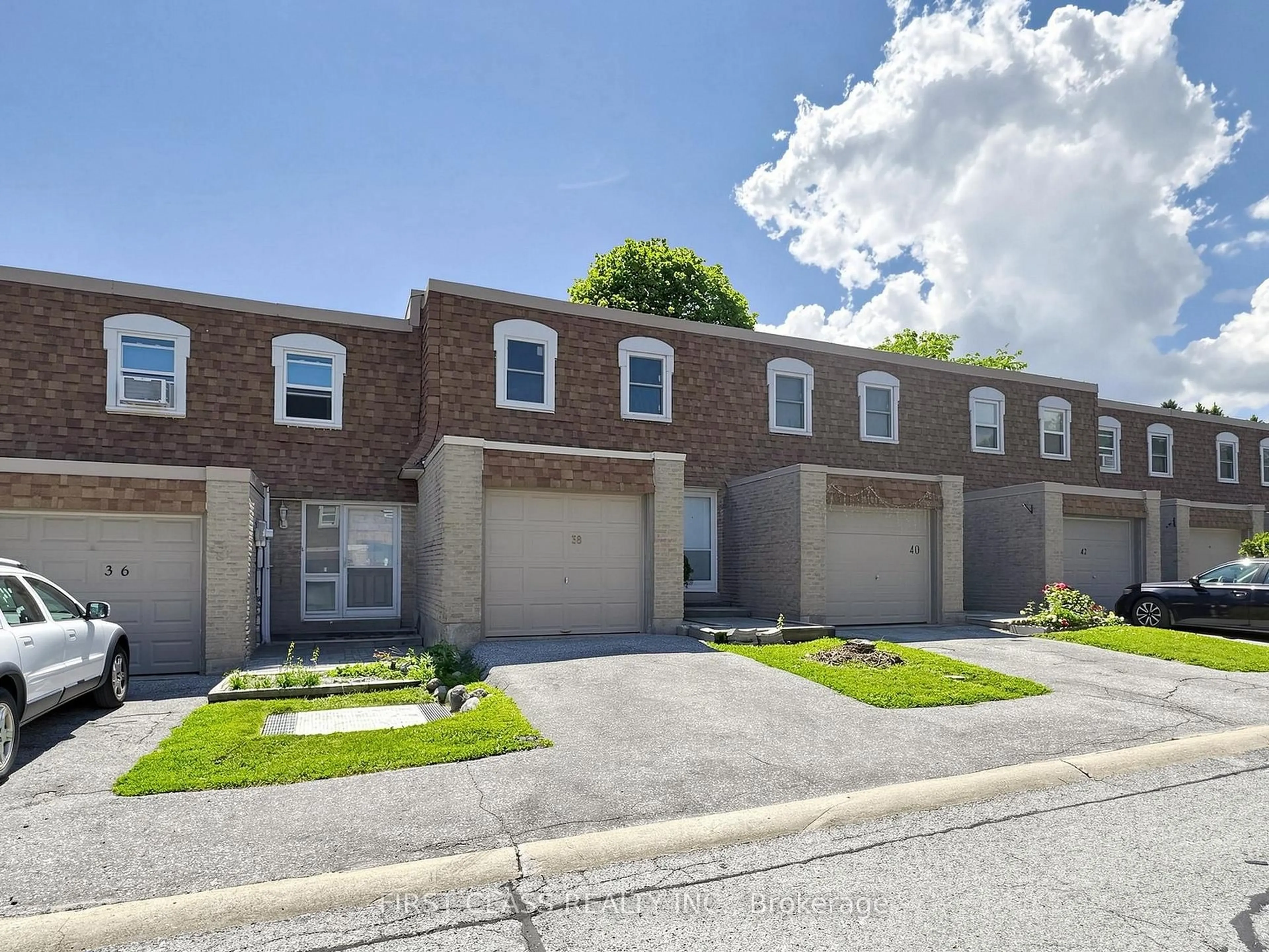 A pic from outside/outdoor area/front of a property/back of a property/a pic from drone, street for 850 Huntingwood Dr #38, Toronto Ontario M1T 2L9