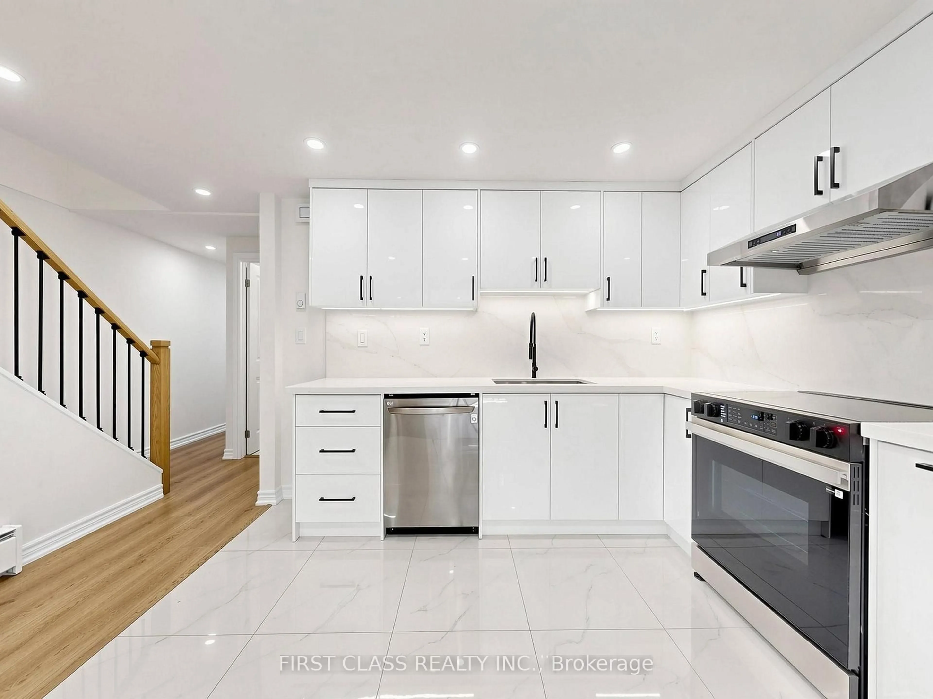 Open concept kitchen, ceramic/tile floor for 850 Huntingwood Dr #38, Toronto Ontario M1T 2L9