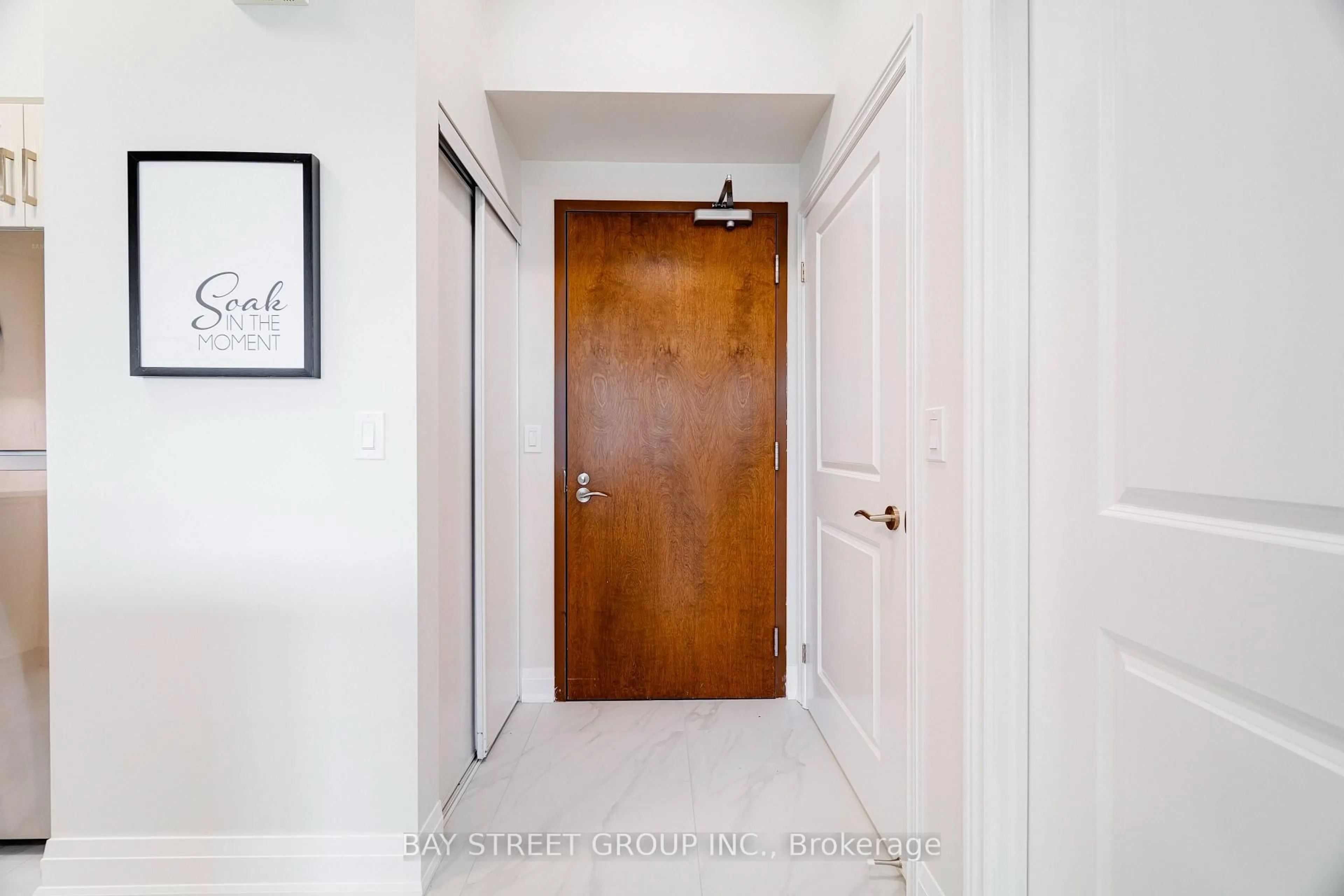 Indoor entryway for 1038 Mcnicoll Ave #218, Toronto Ontario M1W 0A4