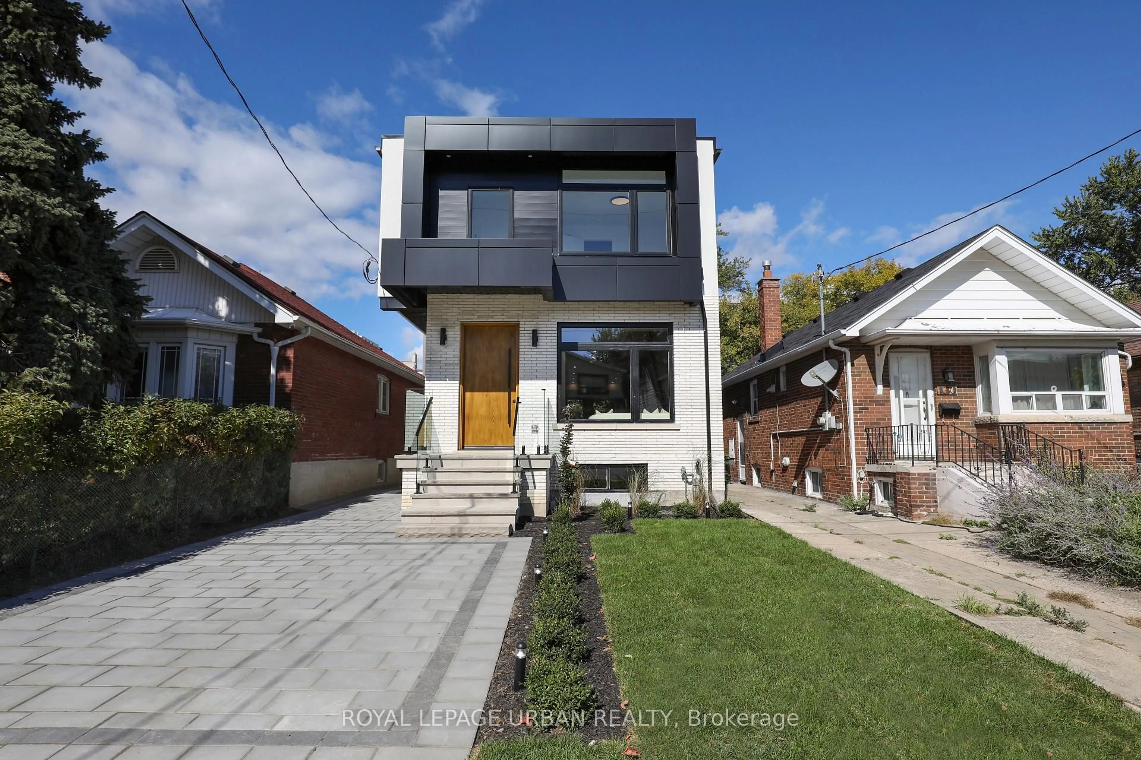 Home with brick exterior material, street for 128 Floyd Ave, Toronto Ontario M4K 2B7