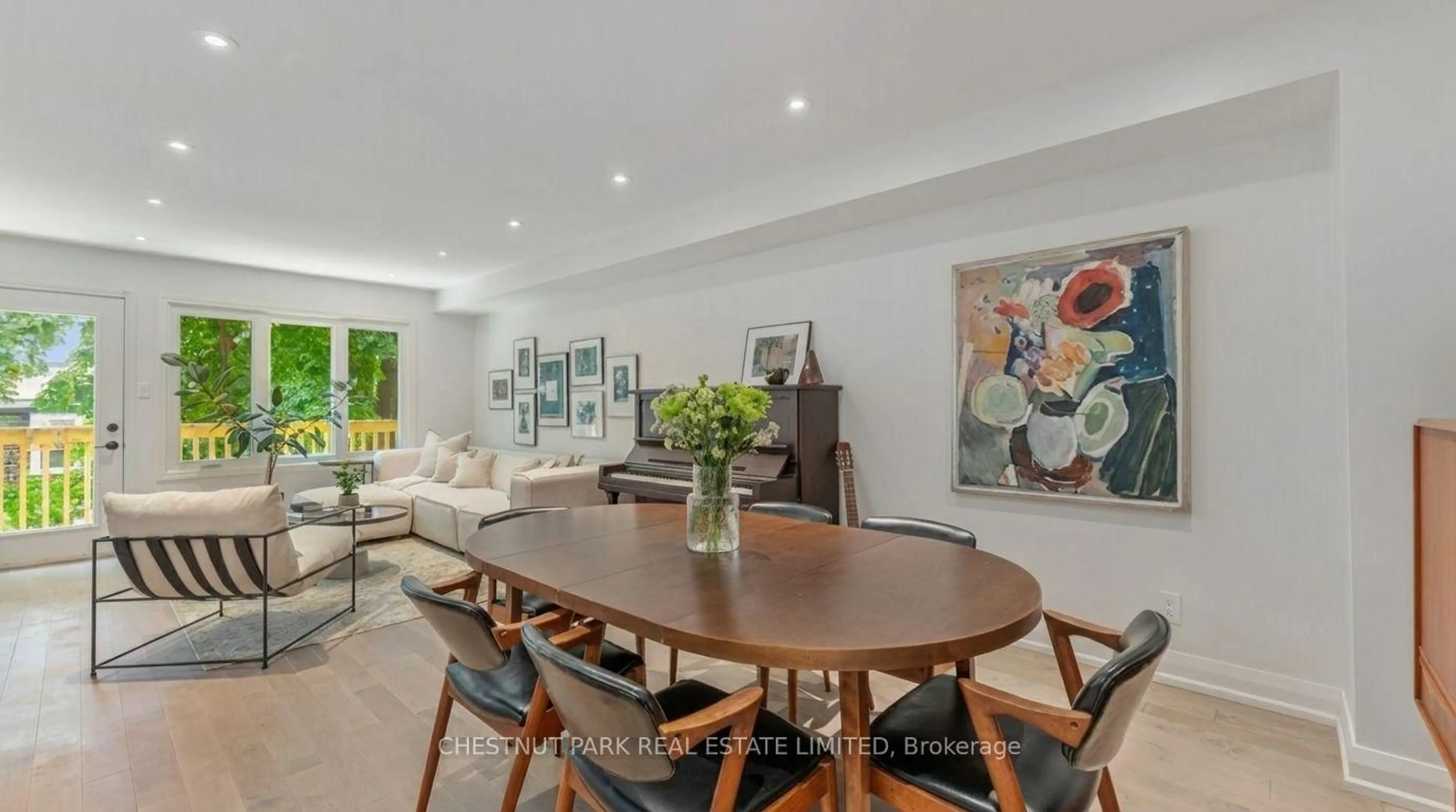 Dining room, wood/laminate floor for 64 Curzon St, Toronto Ontario M4M 3B4