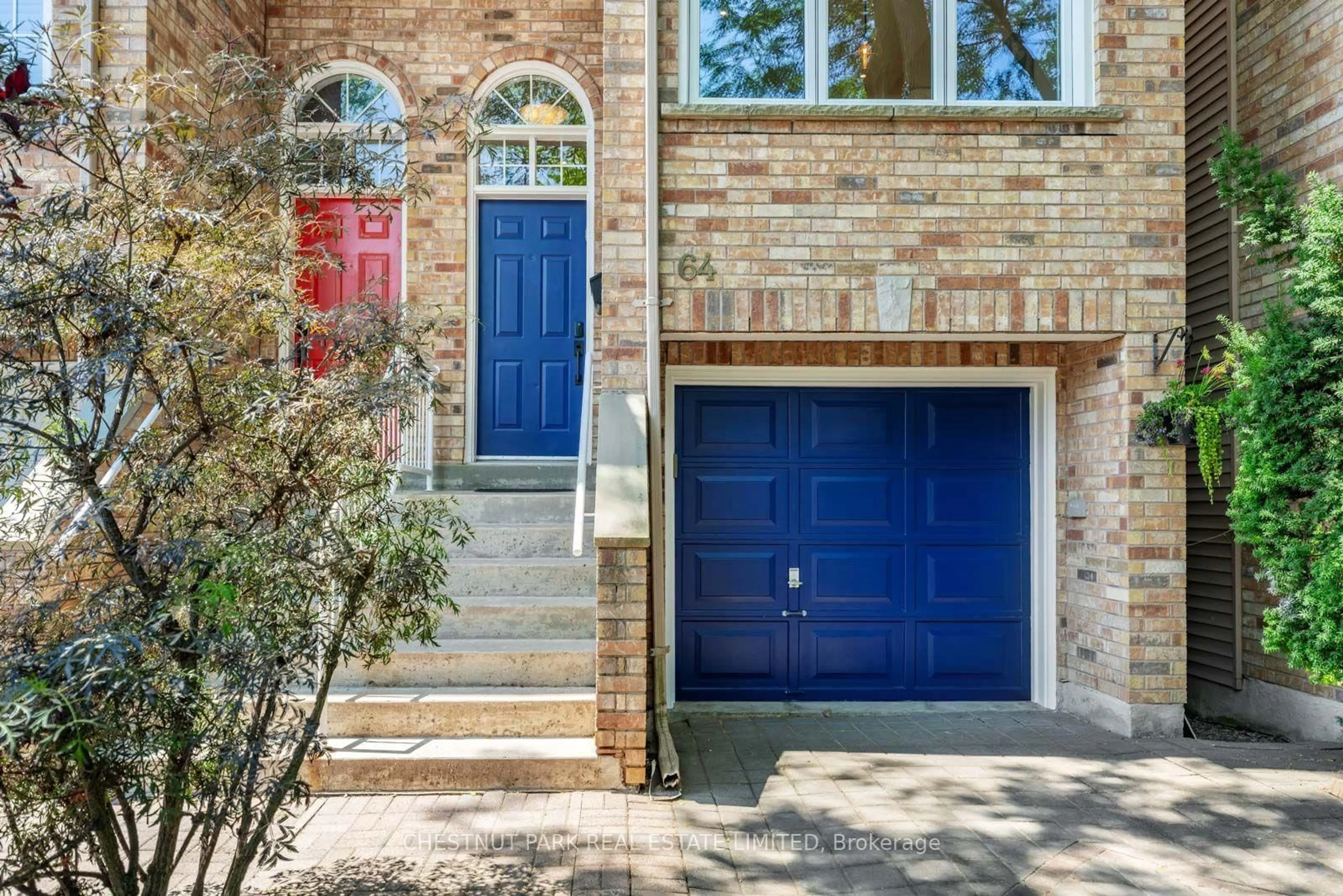 Home with brick exterior material, street for 64 Curzon St, Toronto Ontario M4M 3B4