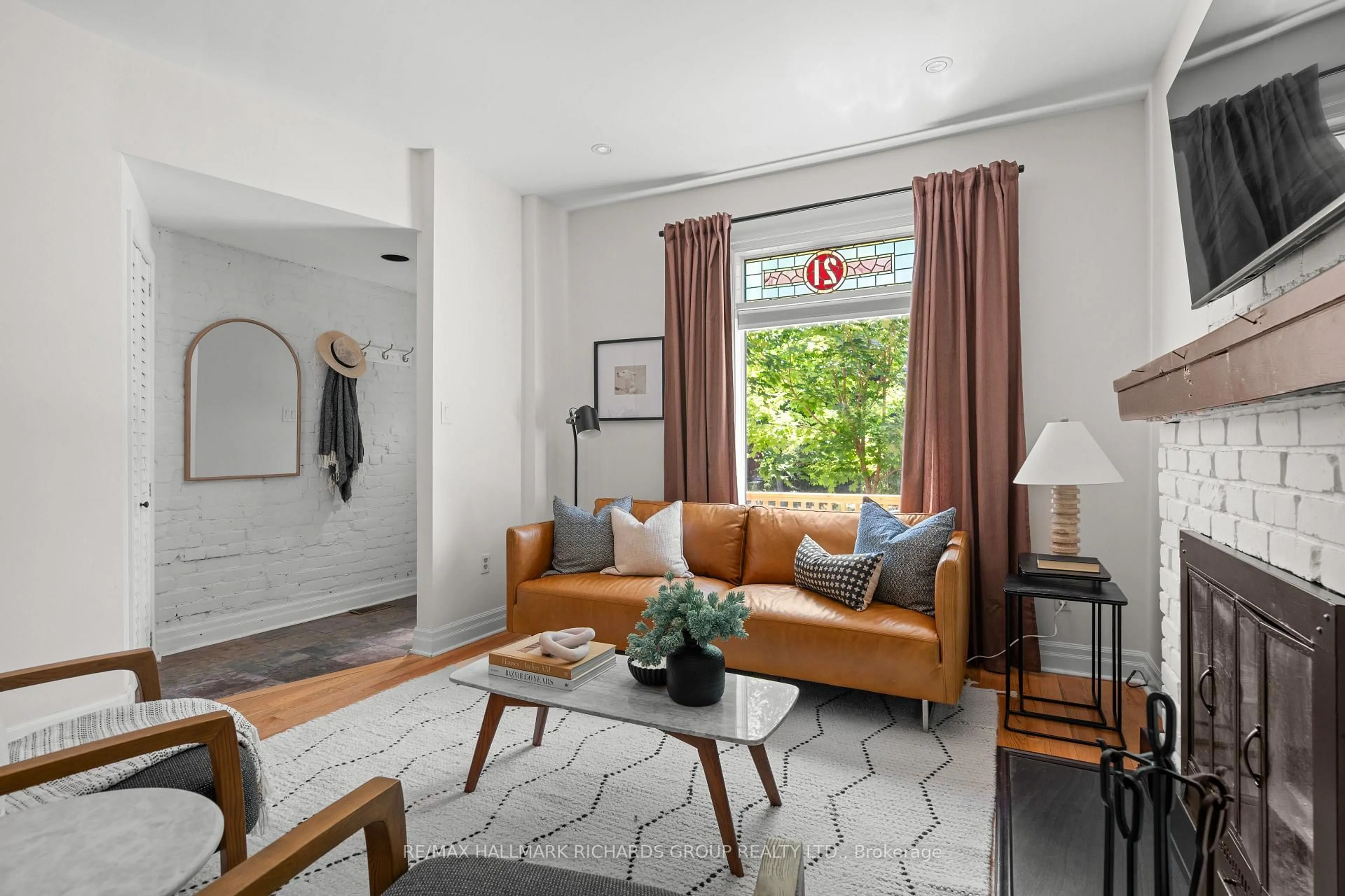 Living room with furniture, unknown for 21 Bertmount Ave, Toronto Ontario M4M 2X8