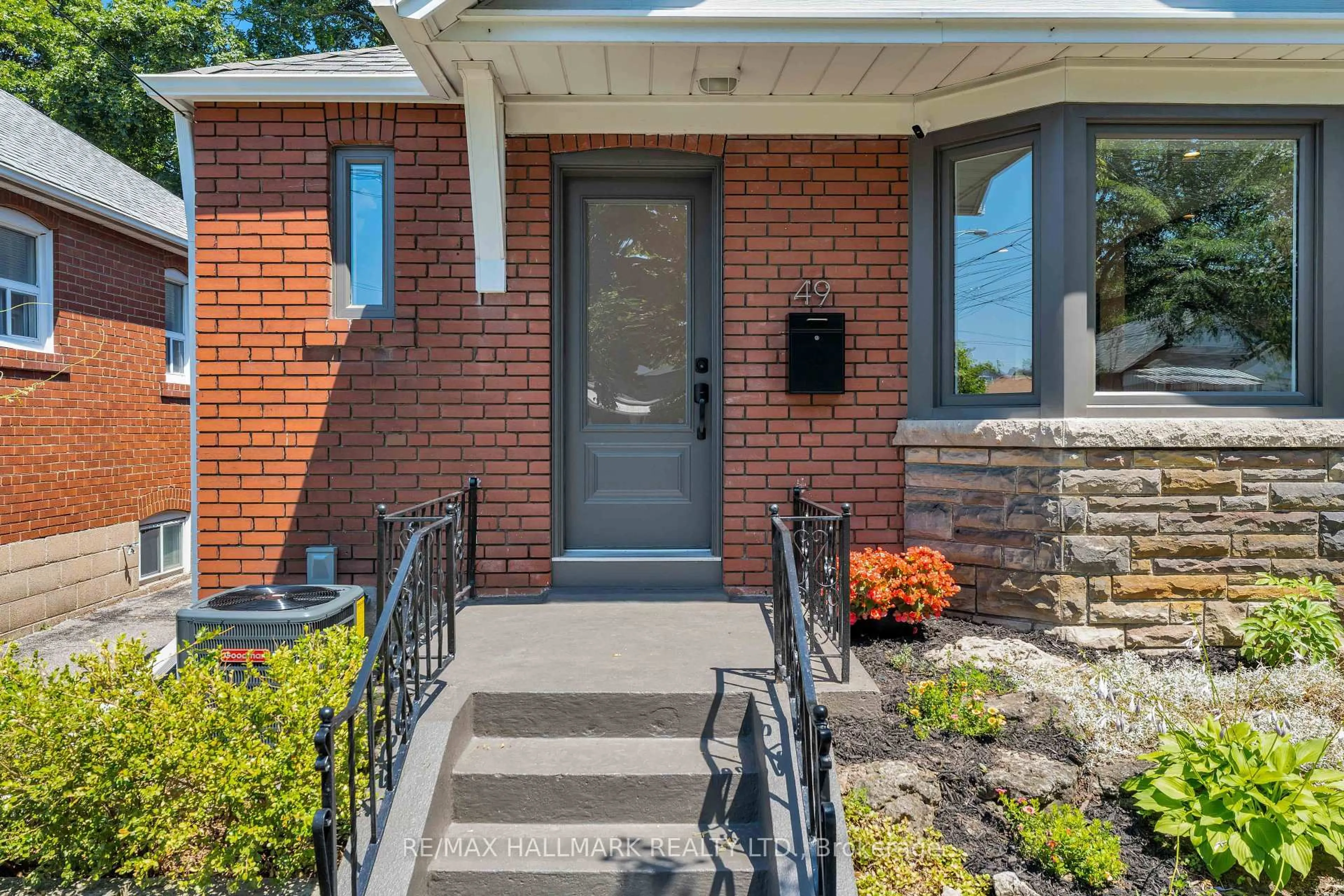 Home with brick exterior material, street for 49 Binswood Ave, Toronto Ontario M4C 3N6