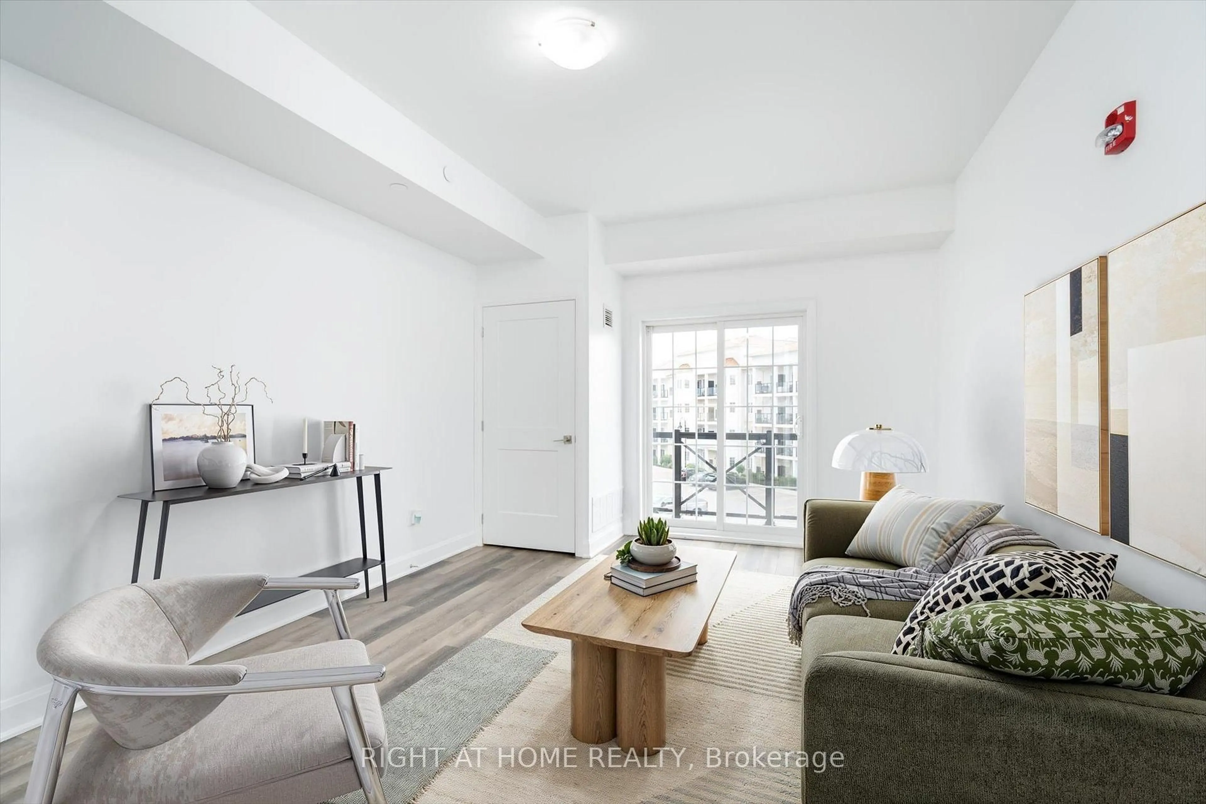 Living room with furniture, unknown for 50 Lakebreeze Dr #321, Clarington Ontario L1B 0V9