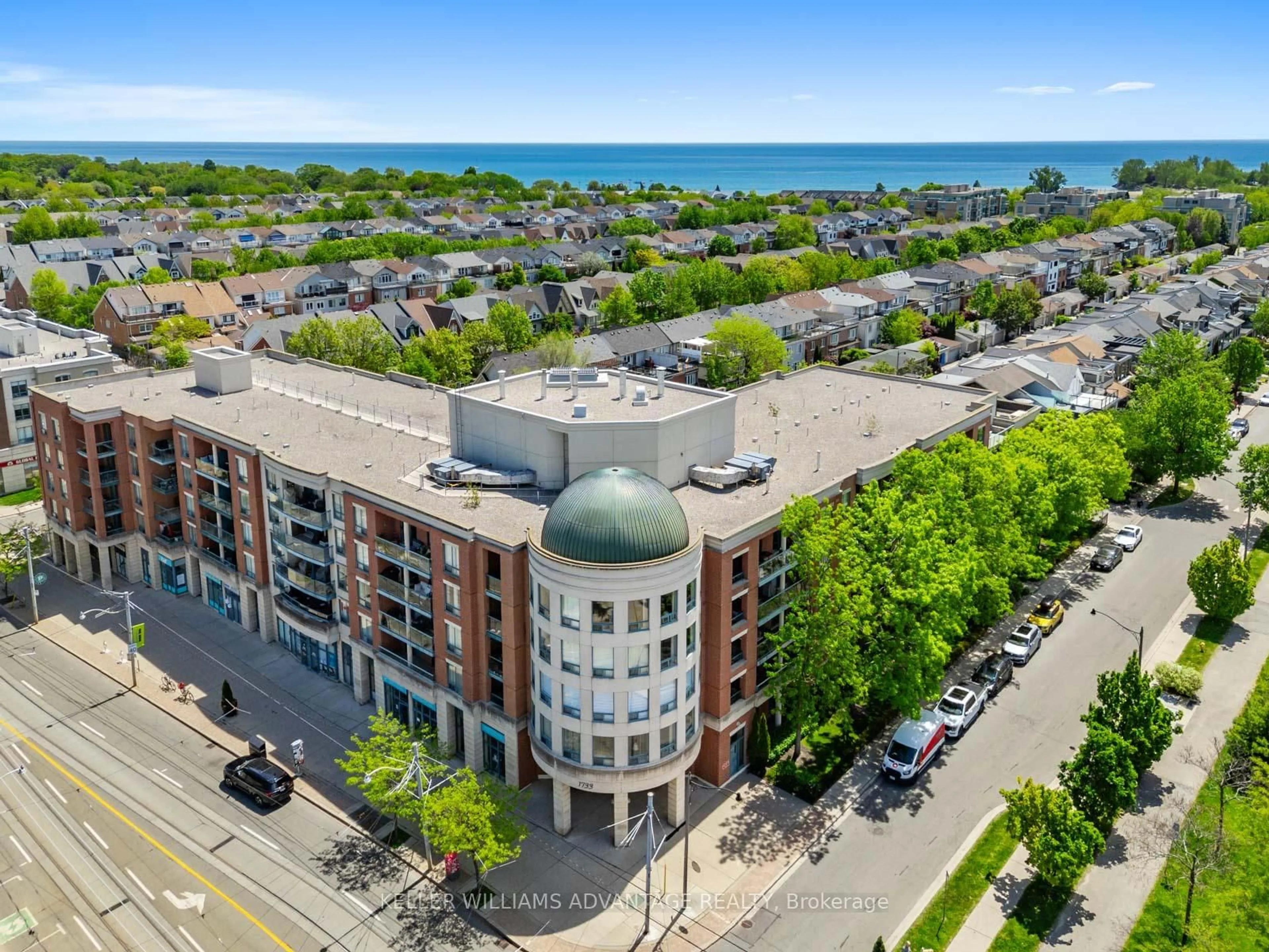 A pic from outside/outdoor area/front of a property/back of a property/a pic from drone, city buildings view from balcony for 1733 Queen St #424, Toronto Ontario M4L 6S9
