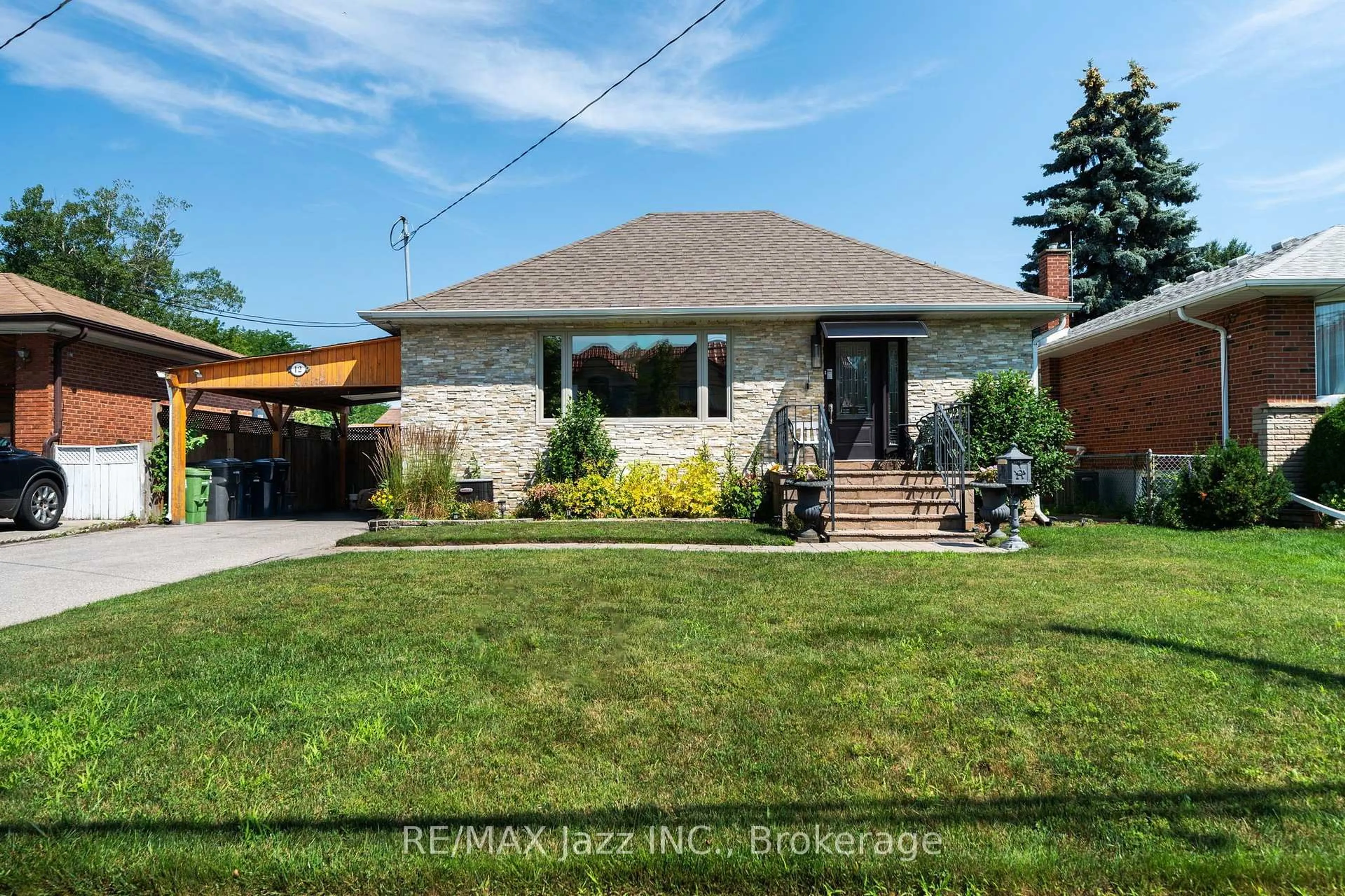 Home with brick exterior material, street for 12 Warnsworth St, Toronto Ontario M1E 2L9