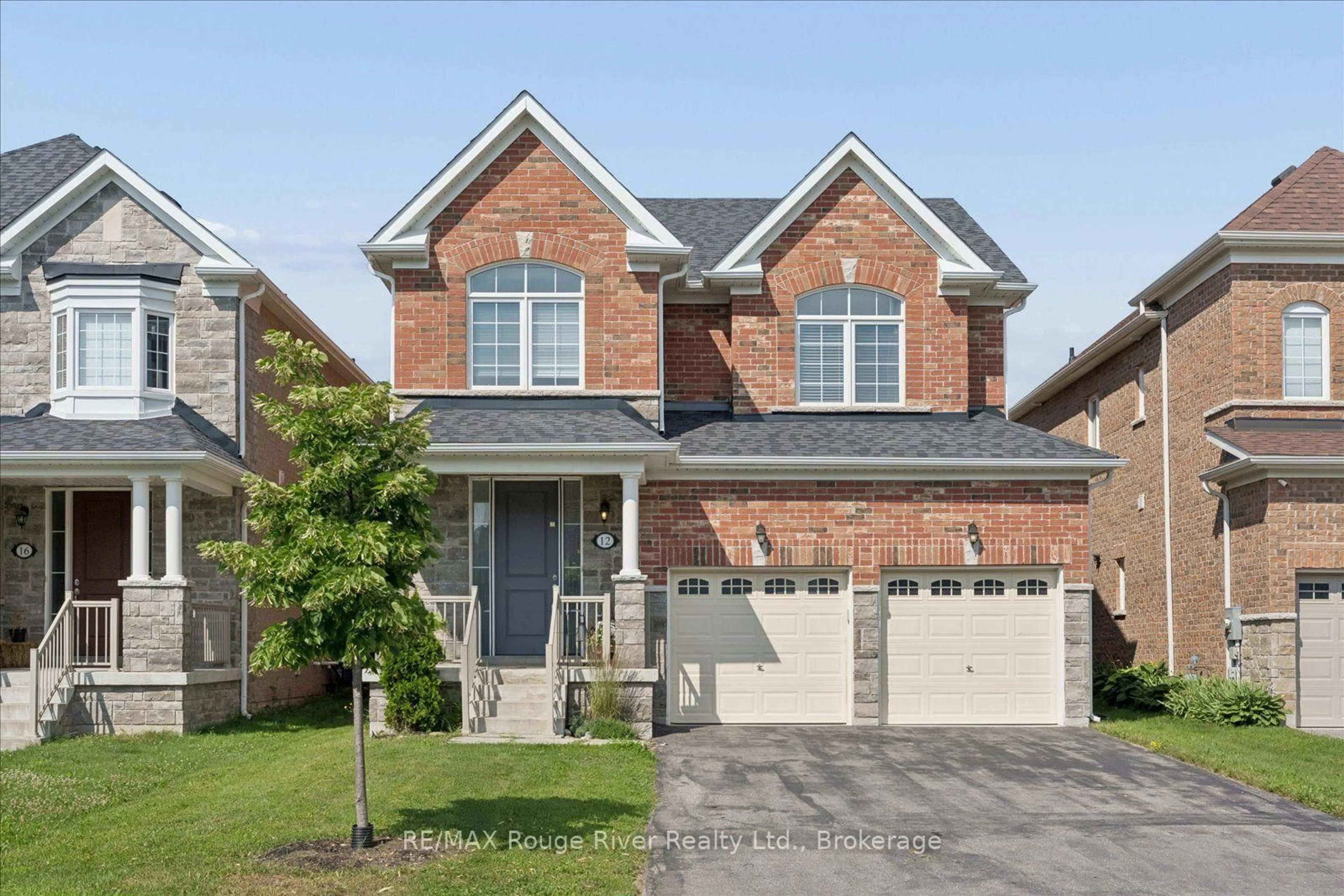 Home with brick exterior material, street for 12 Bill Hutchinson Cres, Clarington Ontario L1C 7E1