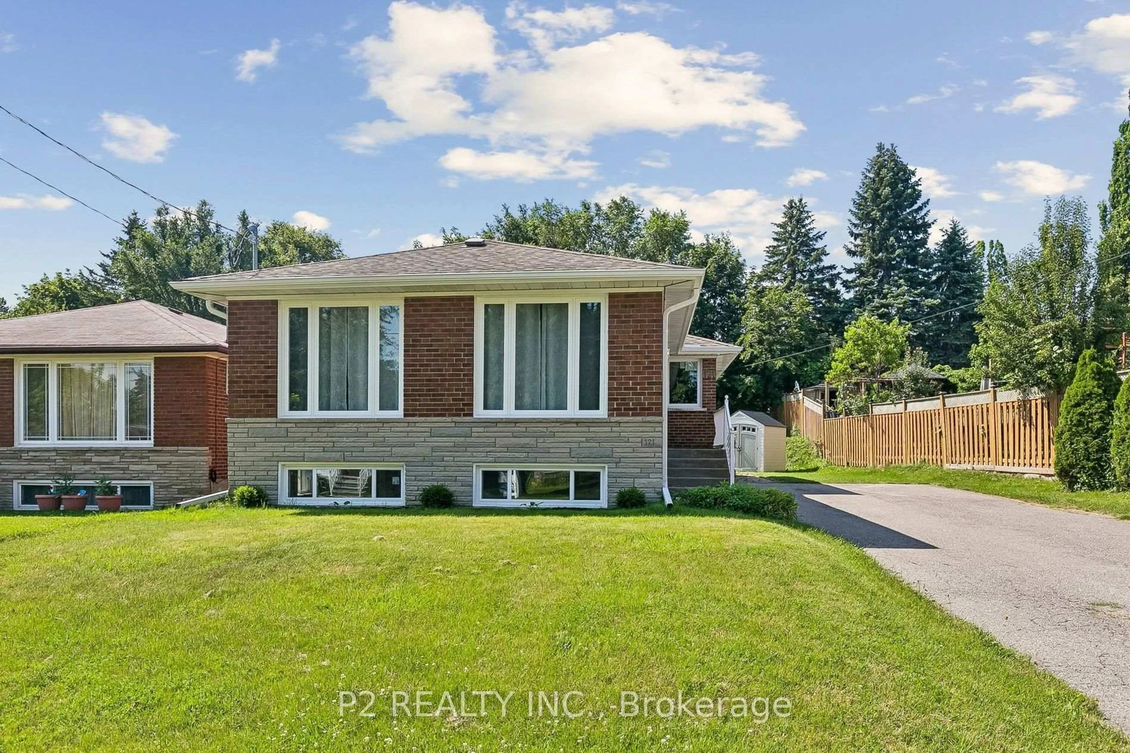 Home with brick exterior material, street for 121 Confederation Dr, Toronto Ontario M1G 1A4