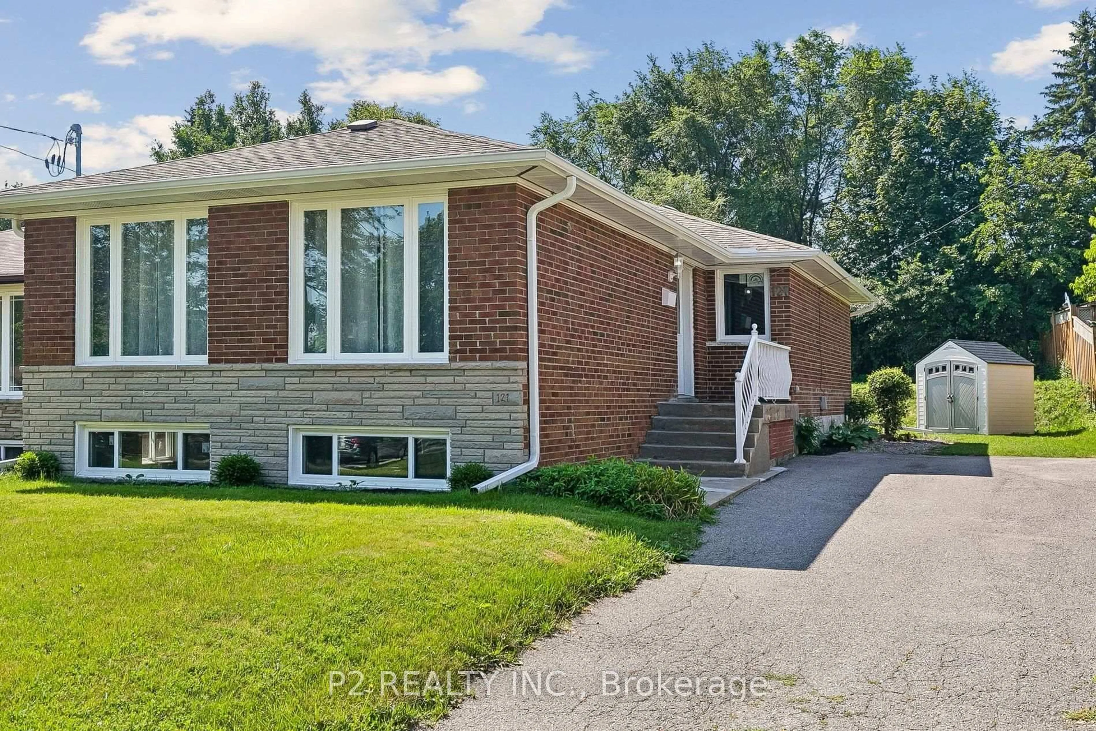 Home with brick exterior material, street for 121 Confederation Dr, Toronto Ontario M1G 1A4