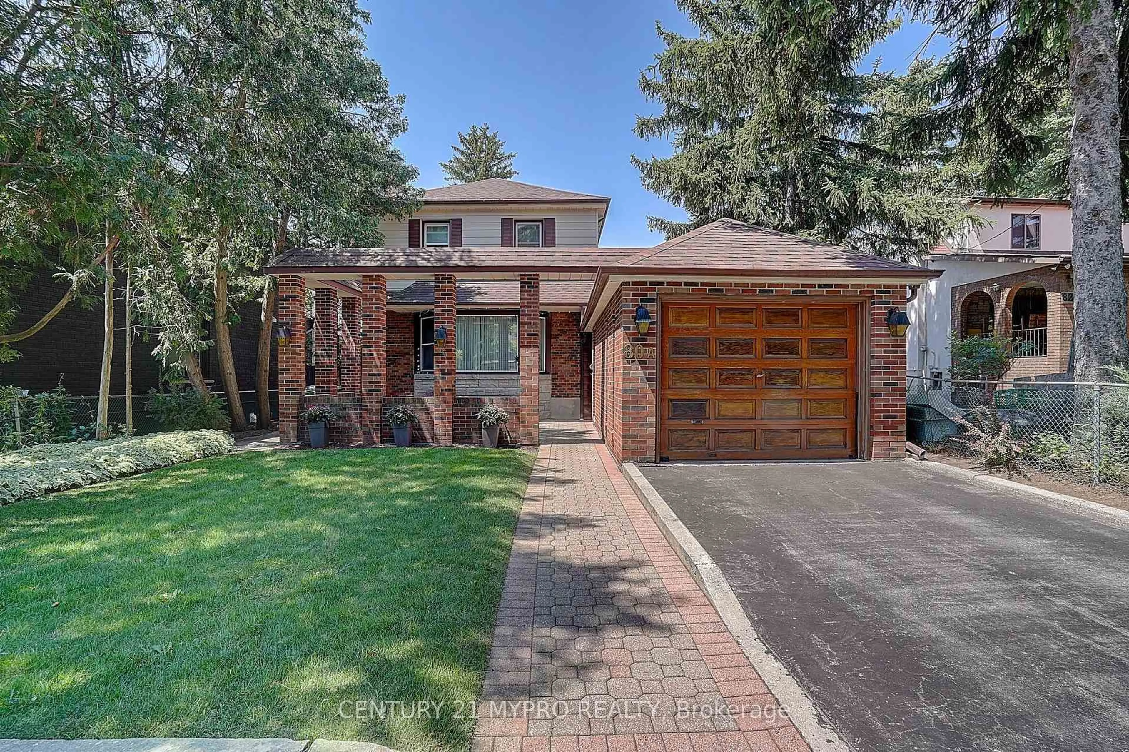 Home with brick exterior material, street for 80A Rosemount Dr, Toronto Ontario M1K 2X3