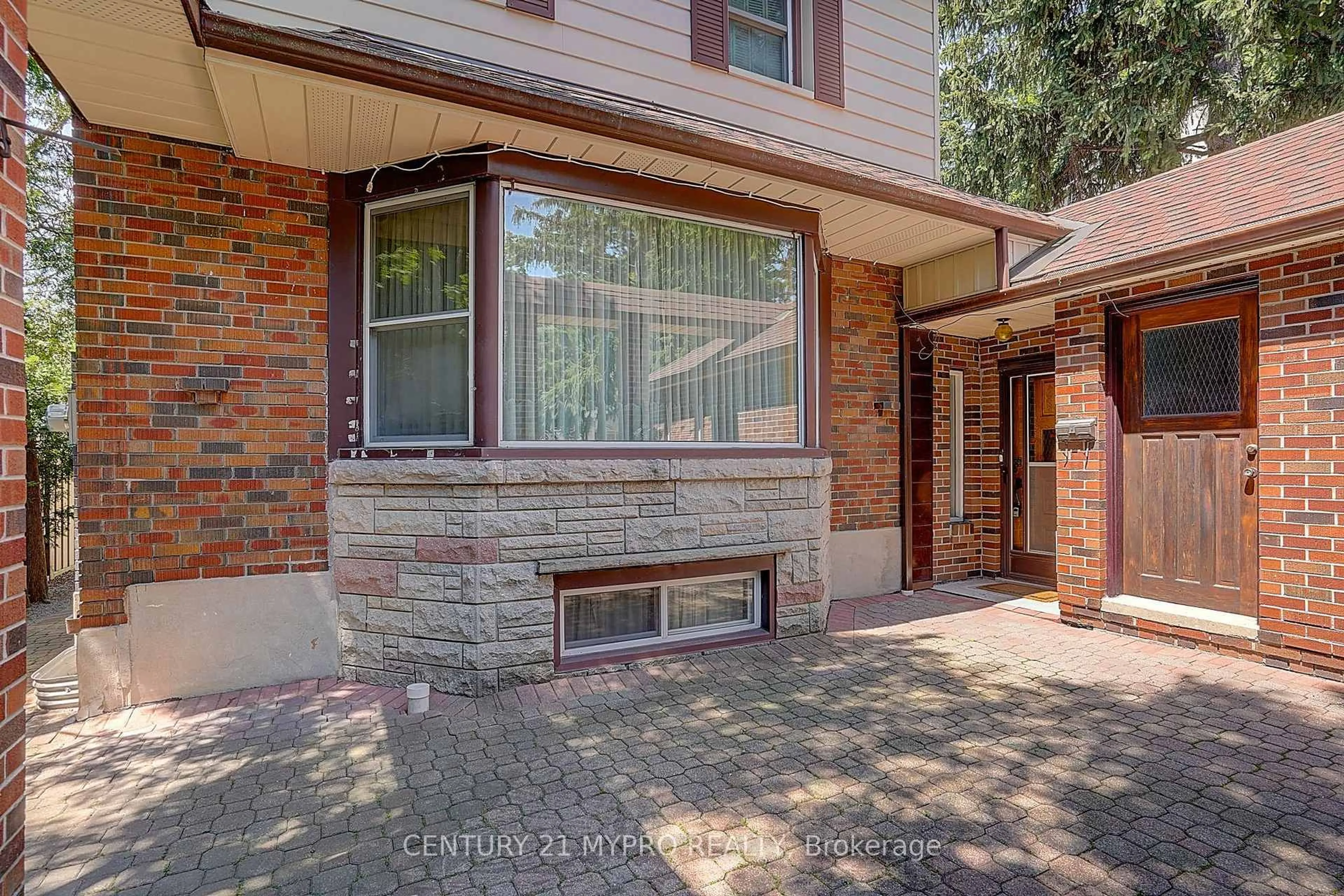 Home with brick exterior material, street for 80A Rosemount Dr, Toronto Ontario M1K 2X3