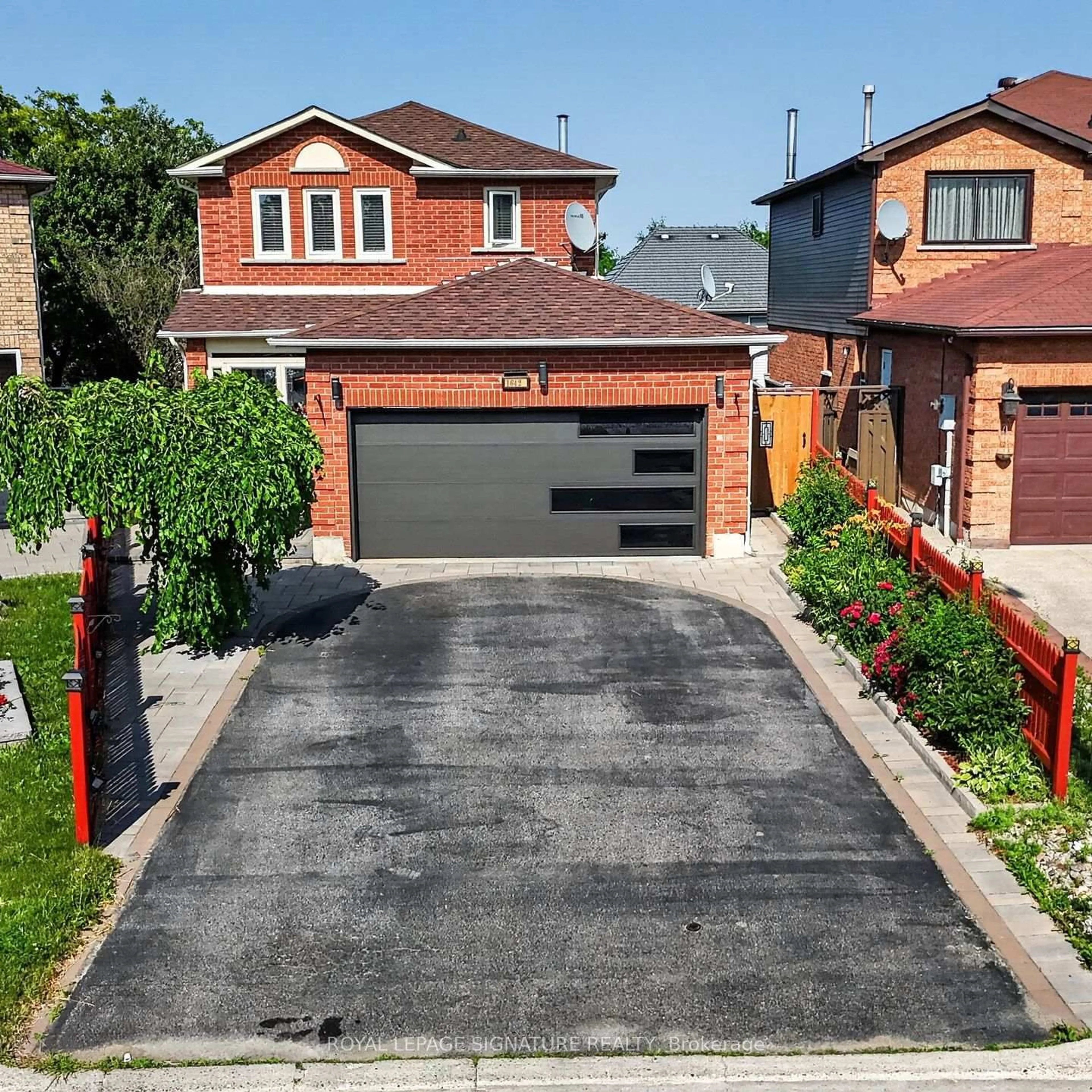 Home with brick exterior material, street for 1642 Pepperwood Gate, Pickering Ontario L1X 2K1