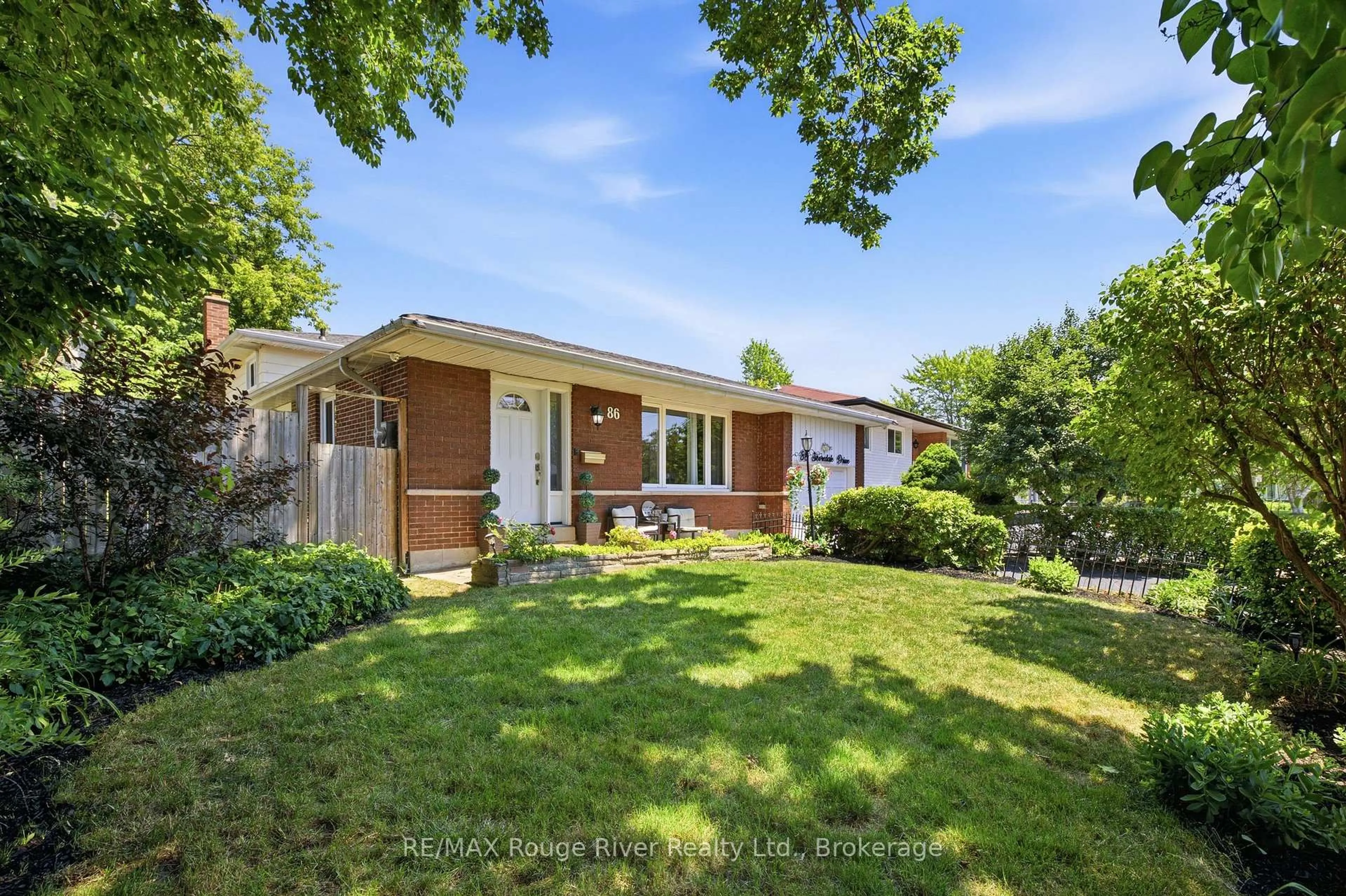 Home with brick exterior material, street for 86 Shoredale Dr, Toronto Ontario M1G 3S9