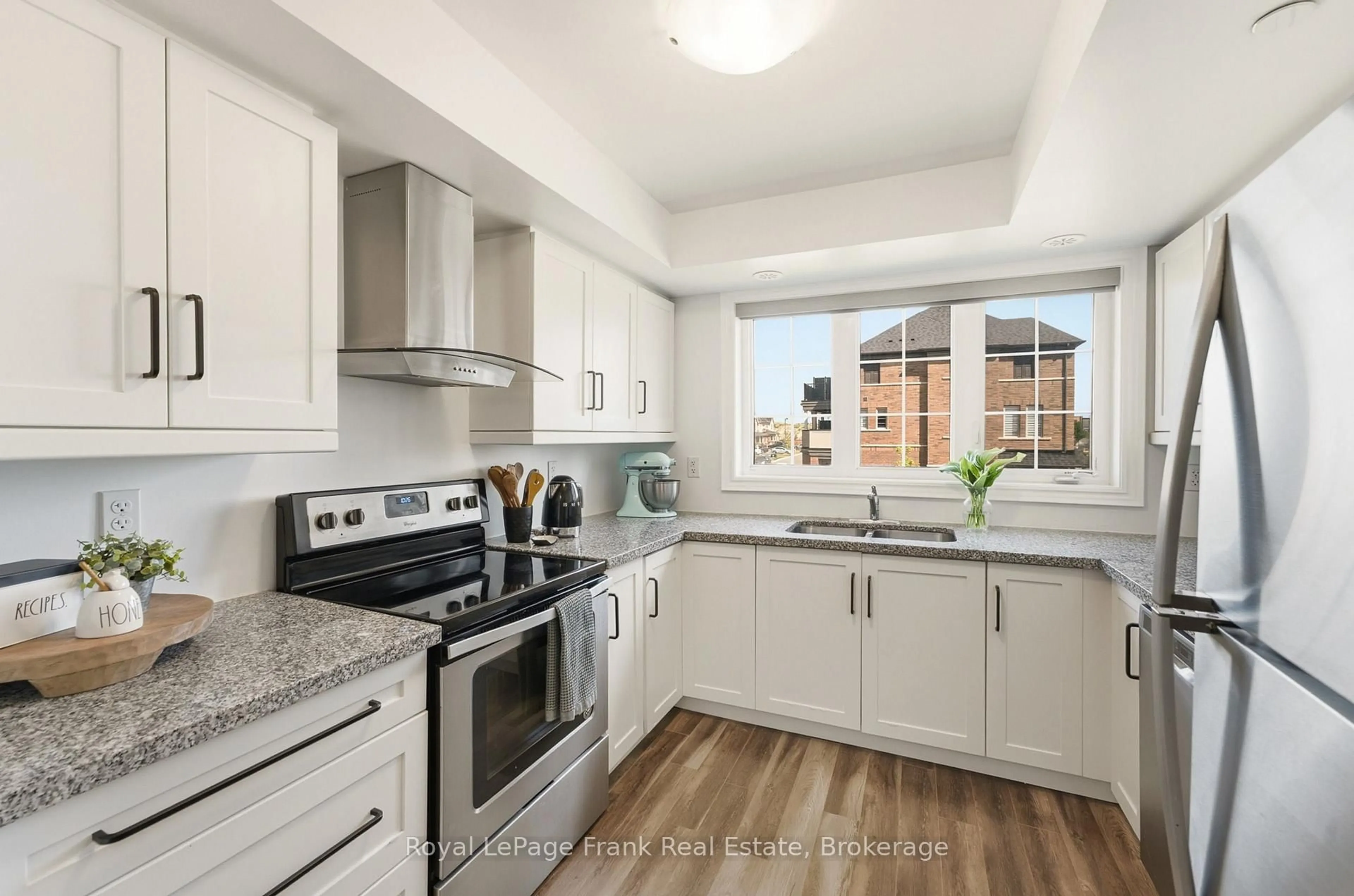 Open concept kitchen, ceramic/tile floor for 2550 Bromus Path #9, Oshawa Ontario L1H 7K4