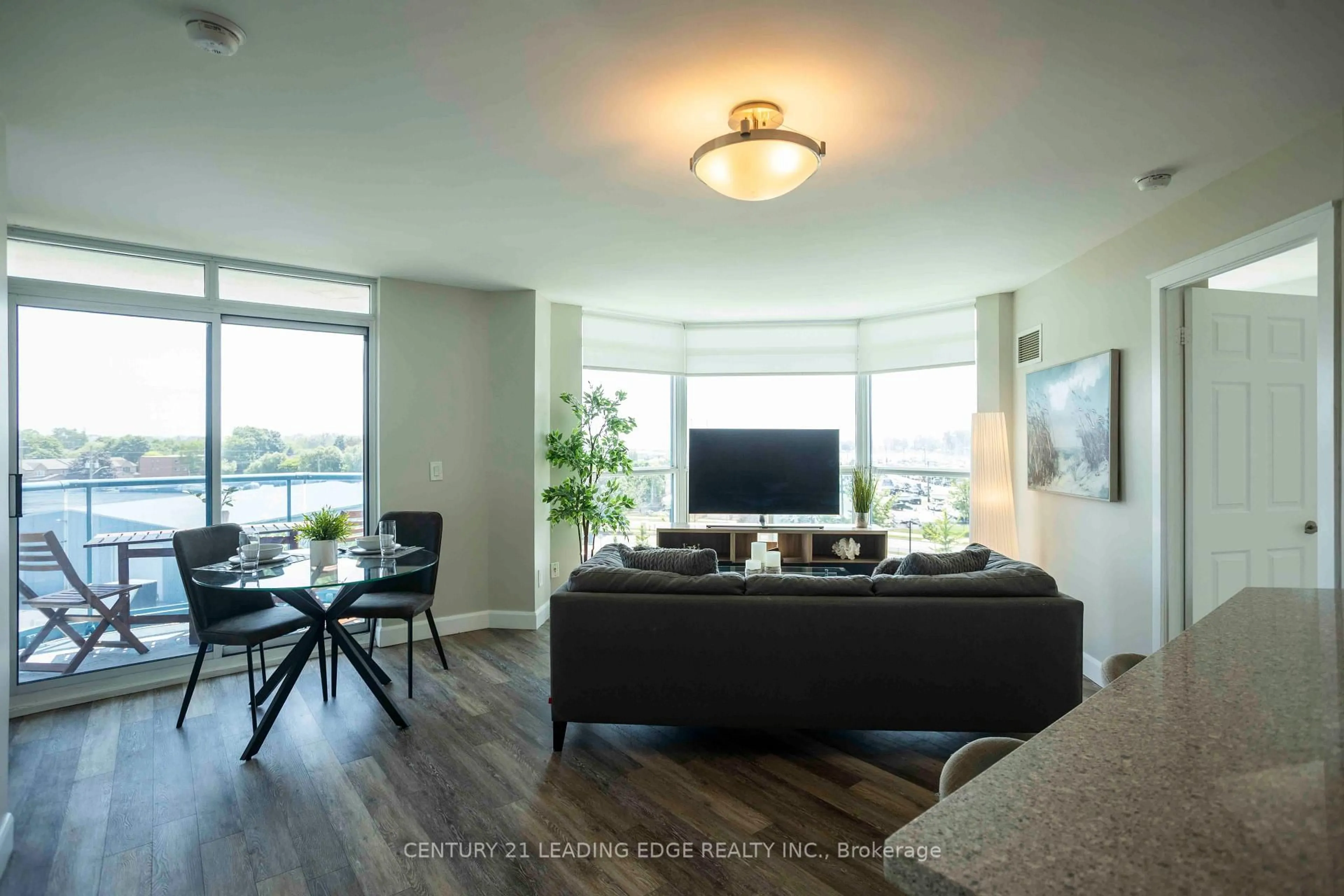 Living room with furniture, unknown for 340 Watson St #402, Whitby Ontario L1N 9G1