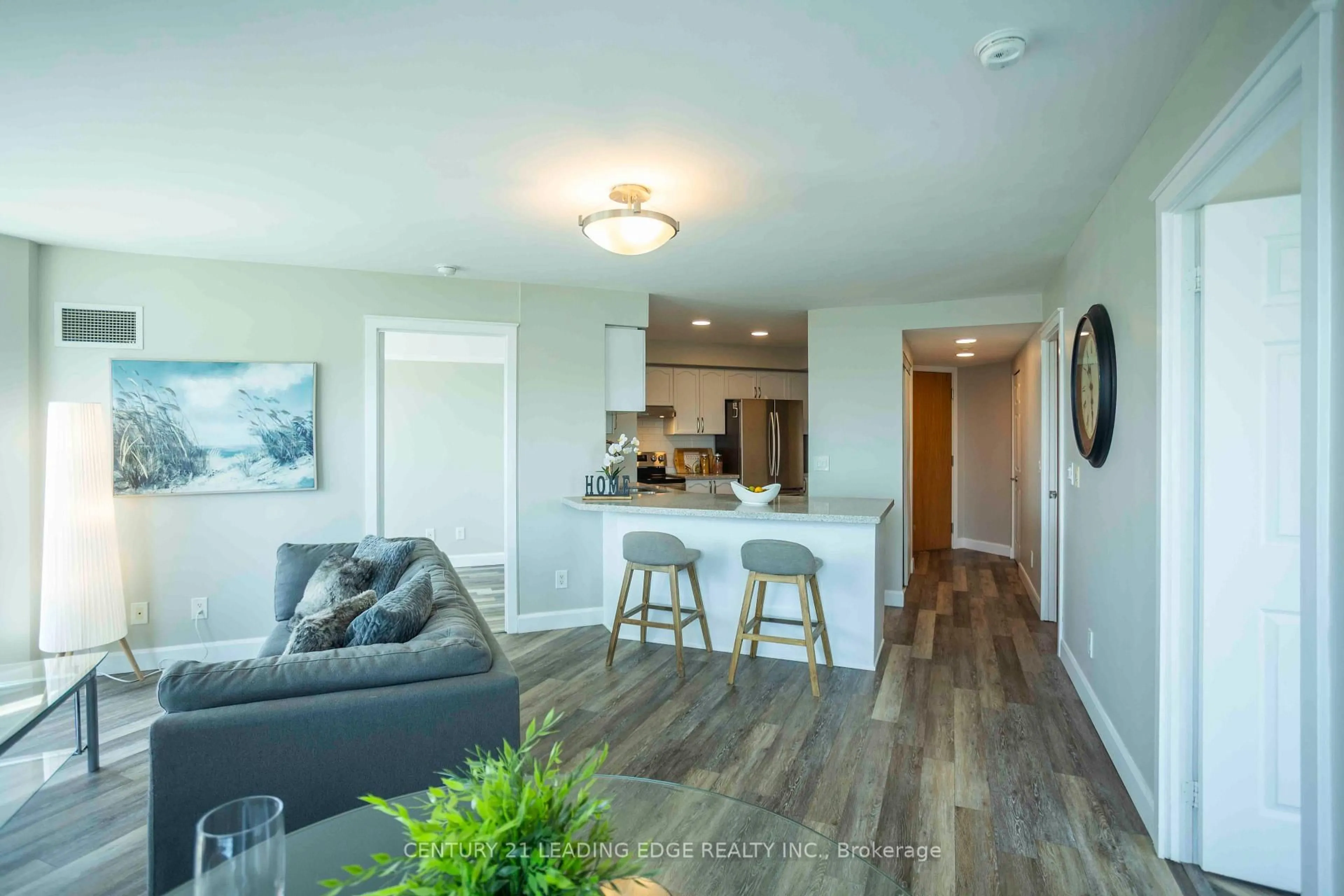 Open concept kitchen, wood/laminate floor for 340 Watson St #402, Whitby Ontario L1N 9G1